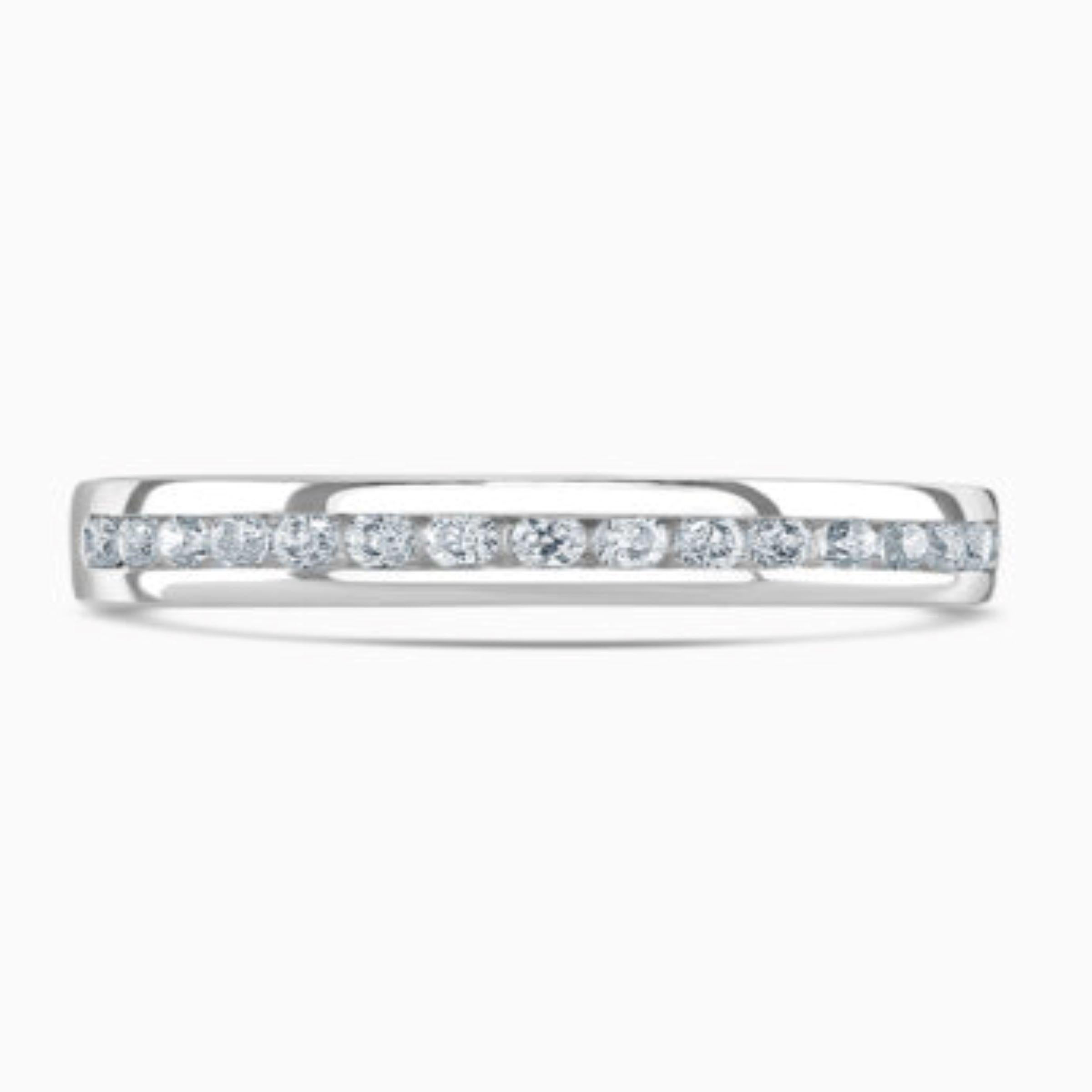 Handcrafted made in Platinum, set with round brilliant cut diamonds adorn 50% of this straight edged band. Total carat weight 0.30ct. 

Platinum ring can be re-sized up and down, beautiful contemporary style suitable for daily wear.

This Diamond