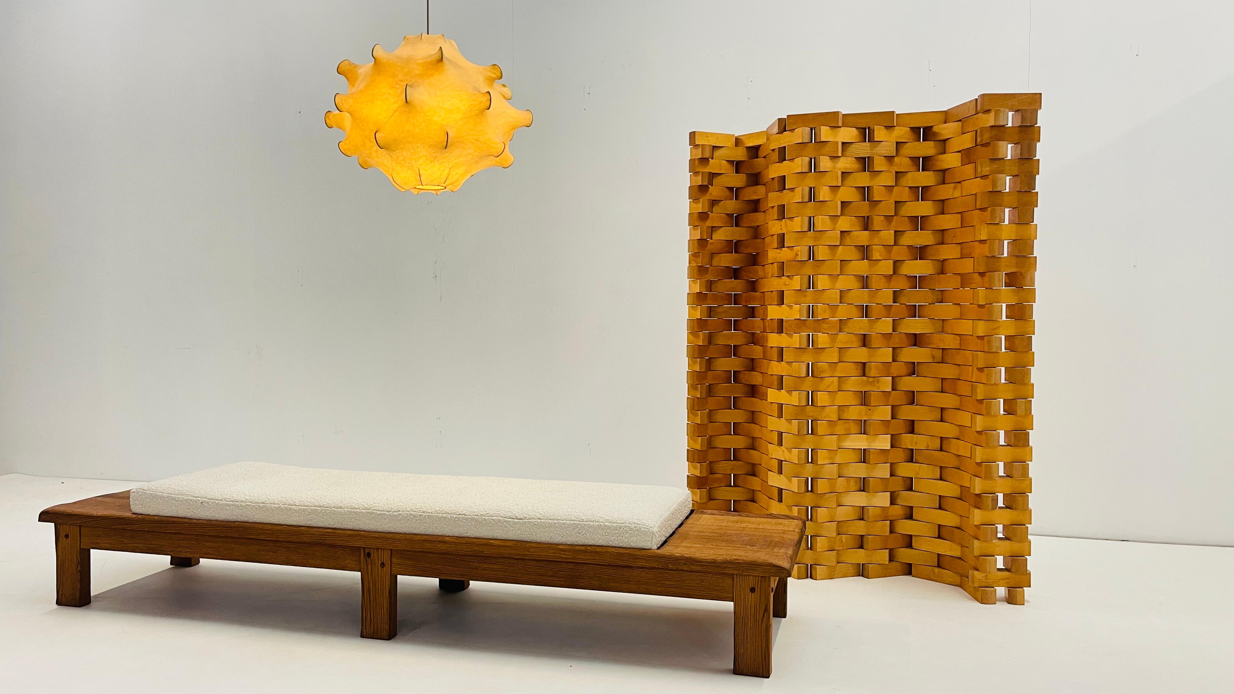 Sculptural Elegance for Any Space

This stunning handcrafted room divider, meticulously designed in solid poplar wood, features a unique interlocking pattern, this piece combines both functionality and artistry, serving as a versatile partition or a
