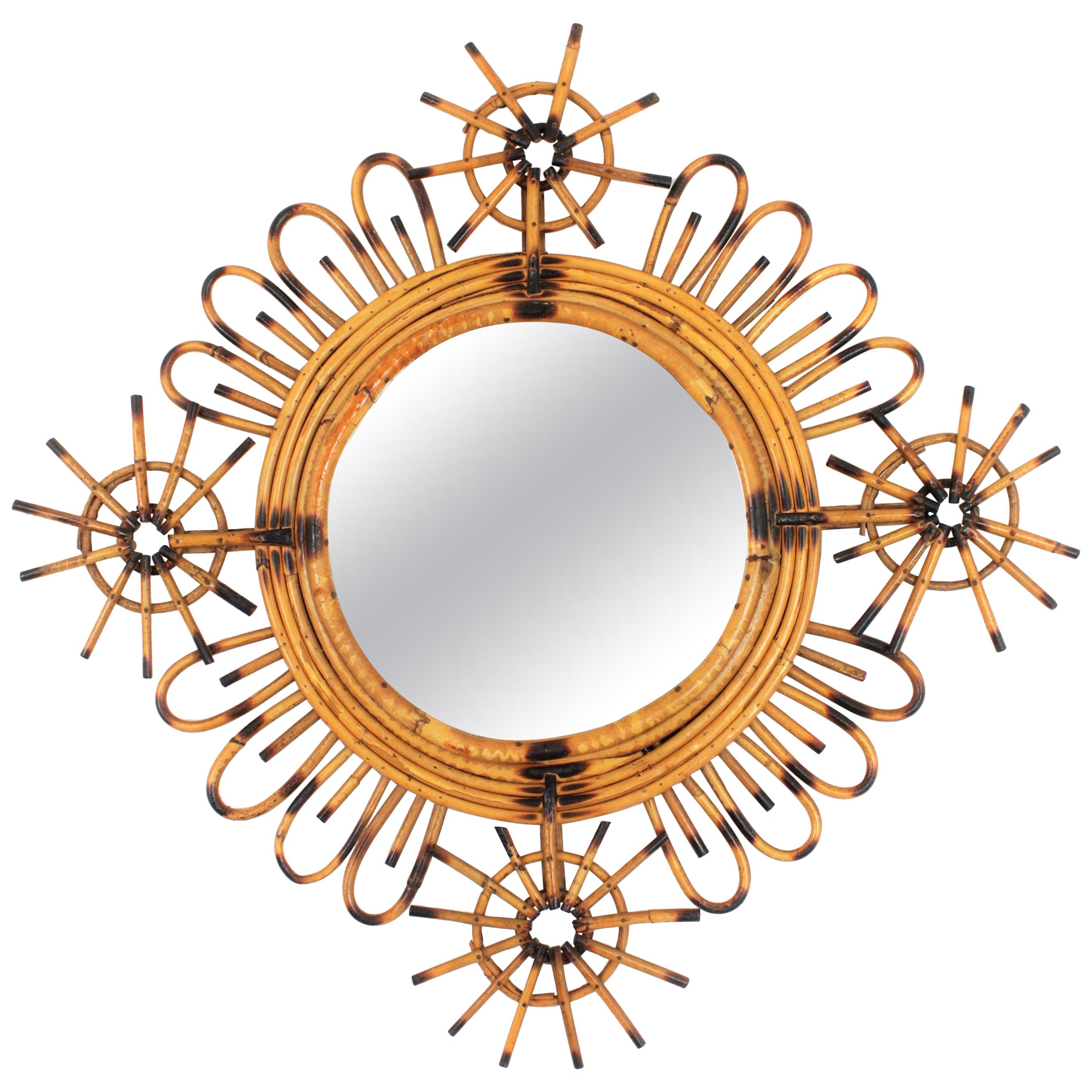 Rattan Spanish Modernist Handcrafted Abstract Sunburst Mirror. Spain, 1950-1960.
Mediterranean style handcrafted abstract sunburst rattan mirror. Unusual design.
This mirror has a highly decorative geometric frame with rattan petals an abstract