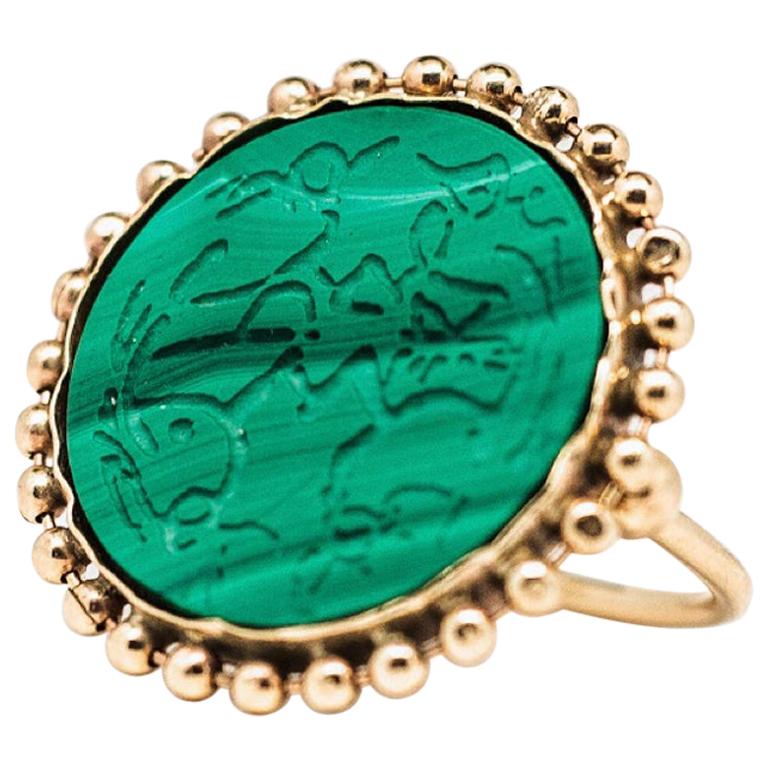 Handcrafted Rising Phoenix Malachite 14 Karat Gold Signet Ring by L'Enchanteur For Sale
