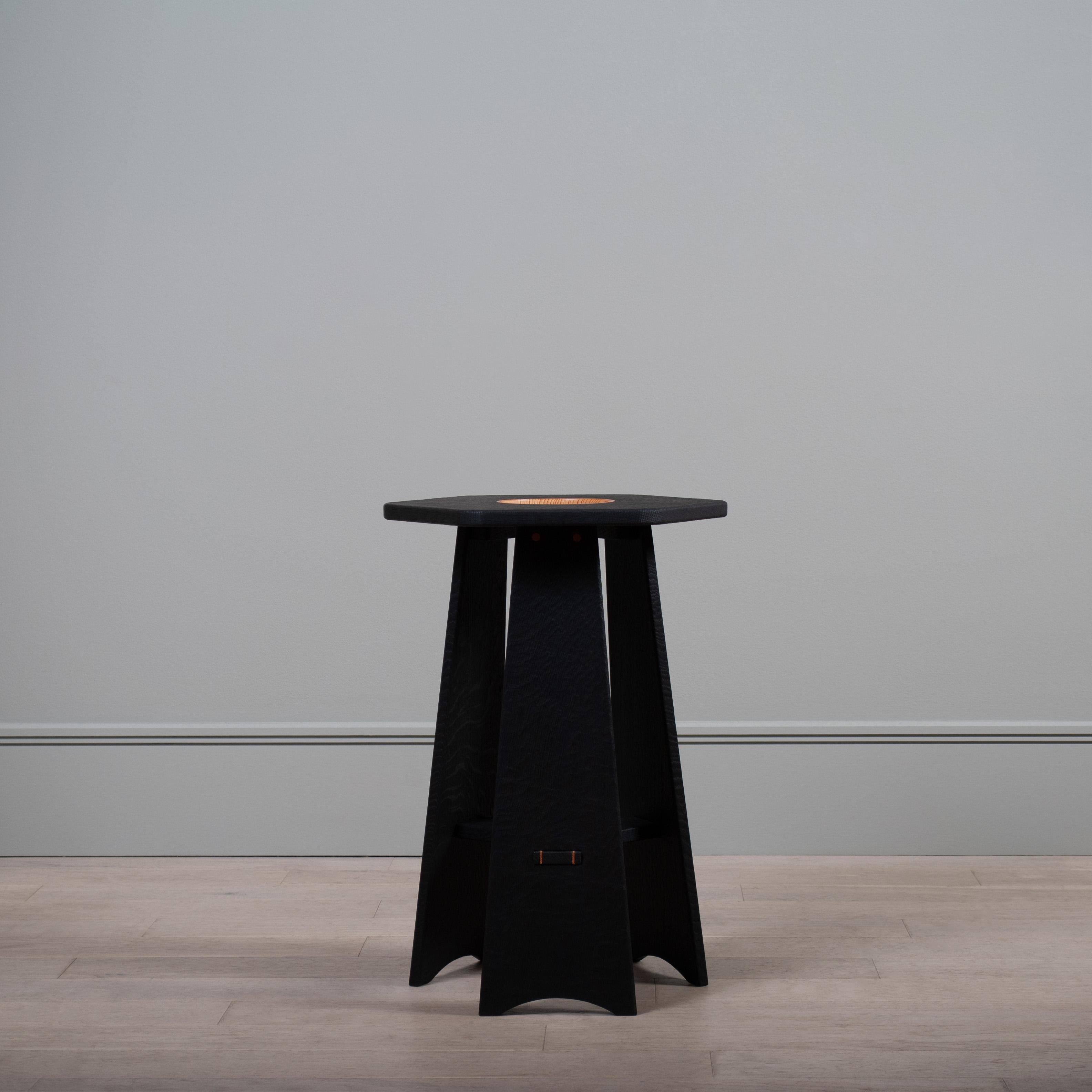 Handcrafted scorched English oak side table.
Taking inspiration from the Arts and Crafts movement this striking contemporary design can inhabit many a style of interior space. The oak undergoes a highly skilful scorching technique which requires