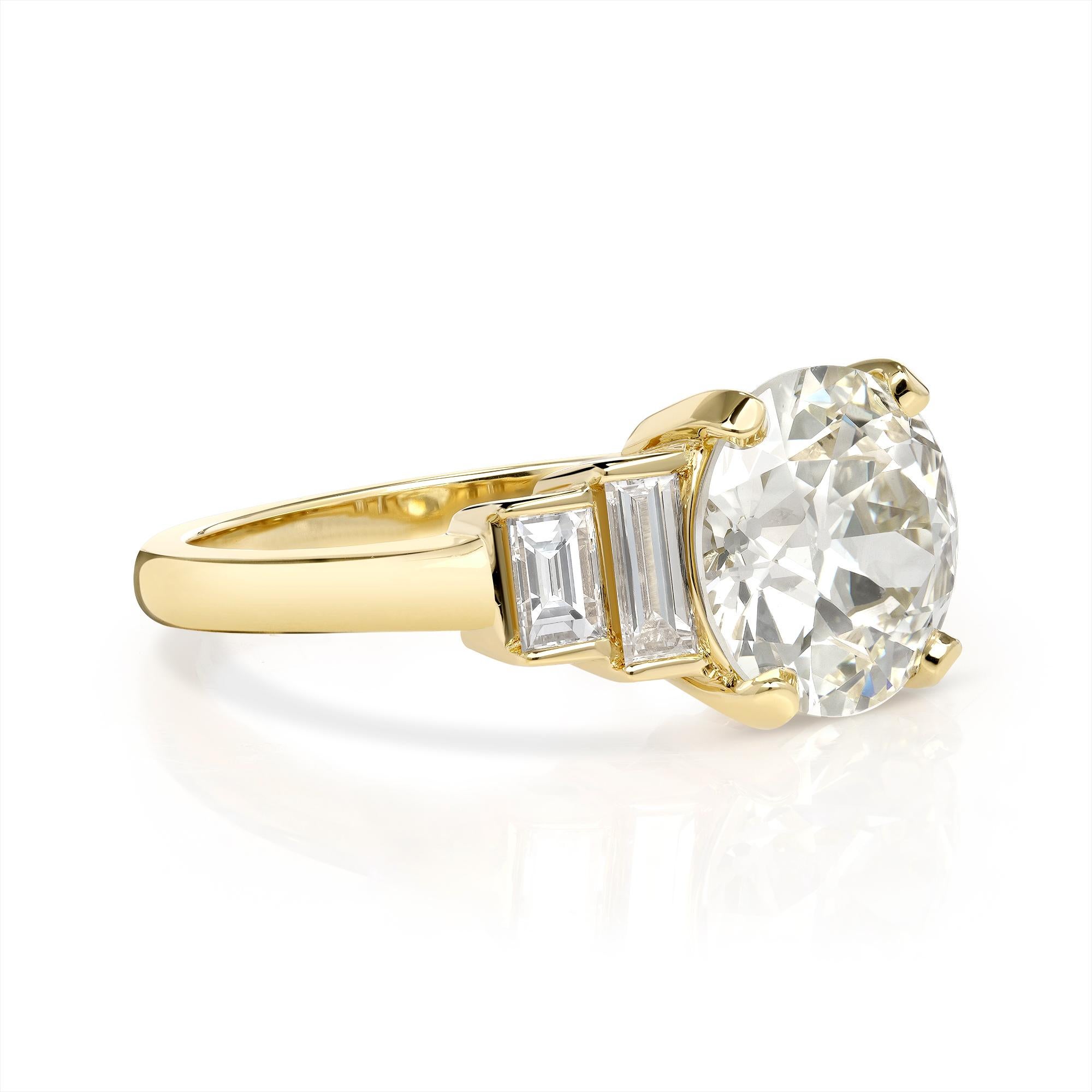 2.54ct N/VS1 GIA certified old European cut diamond with 0.46ctw baguette cut accent diamonds prong set in a handcrafted 18K yellow gold mounting. 
