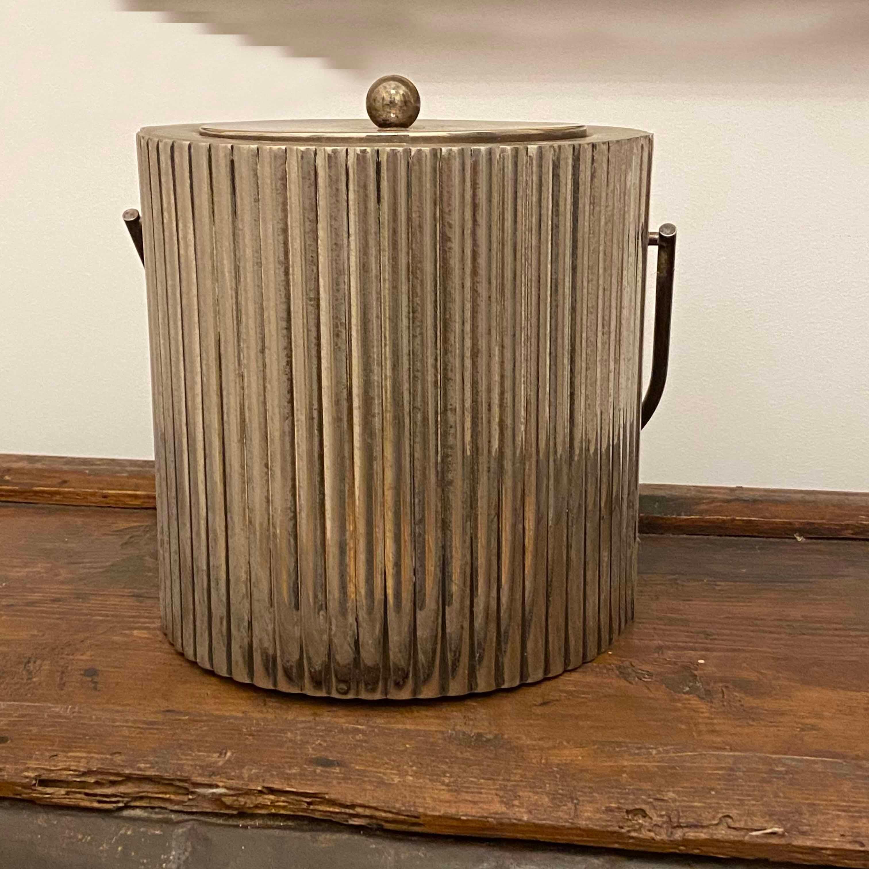 Beautifully handcrafted silver - plate ice bucket in the style of Josef Hoffmann made in Florence, Italy 1960s.
Makers mark on the bottom. 
Measures: 22.5 cm high and 22.7 cm diameter
Max height with handle up 40 cm
Very nice condition, almost