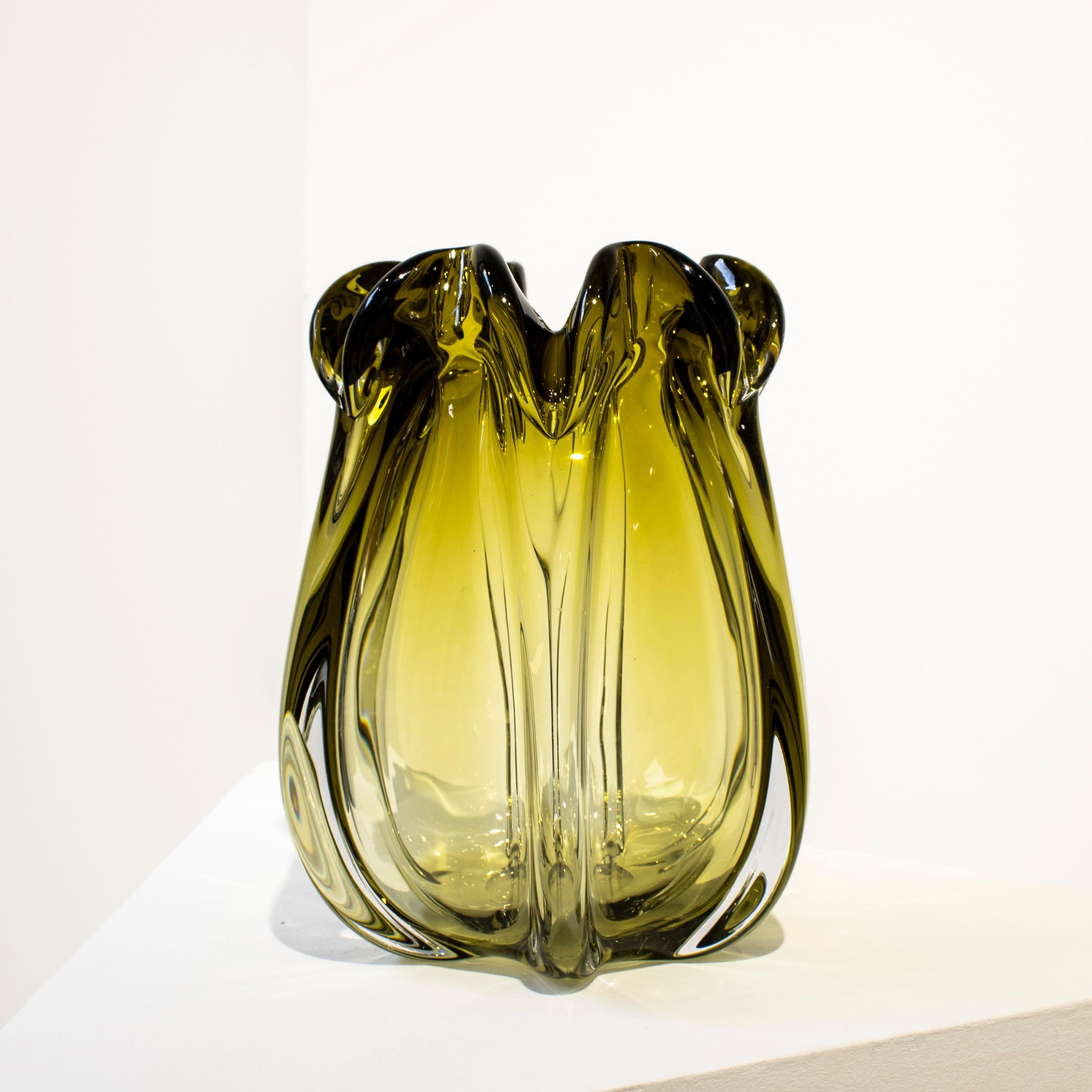 Hand-blown Italian ambar semi-transparent glass vase, with organic shapes inspired by nature. 