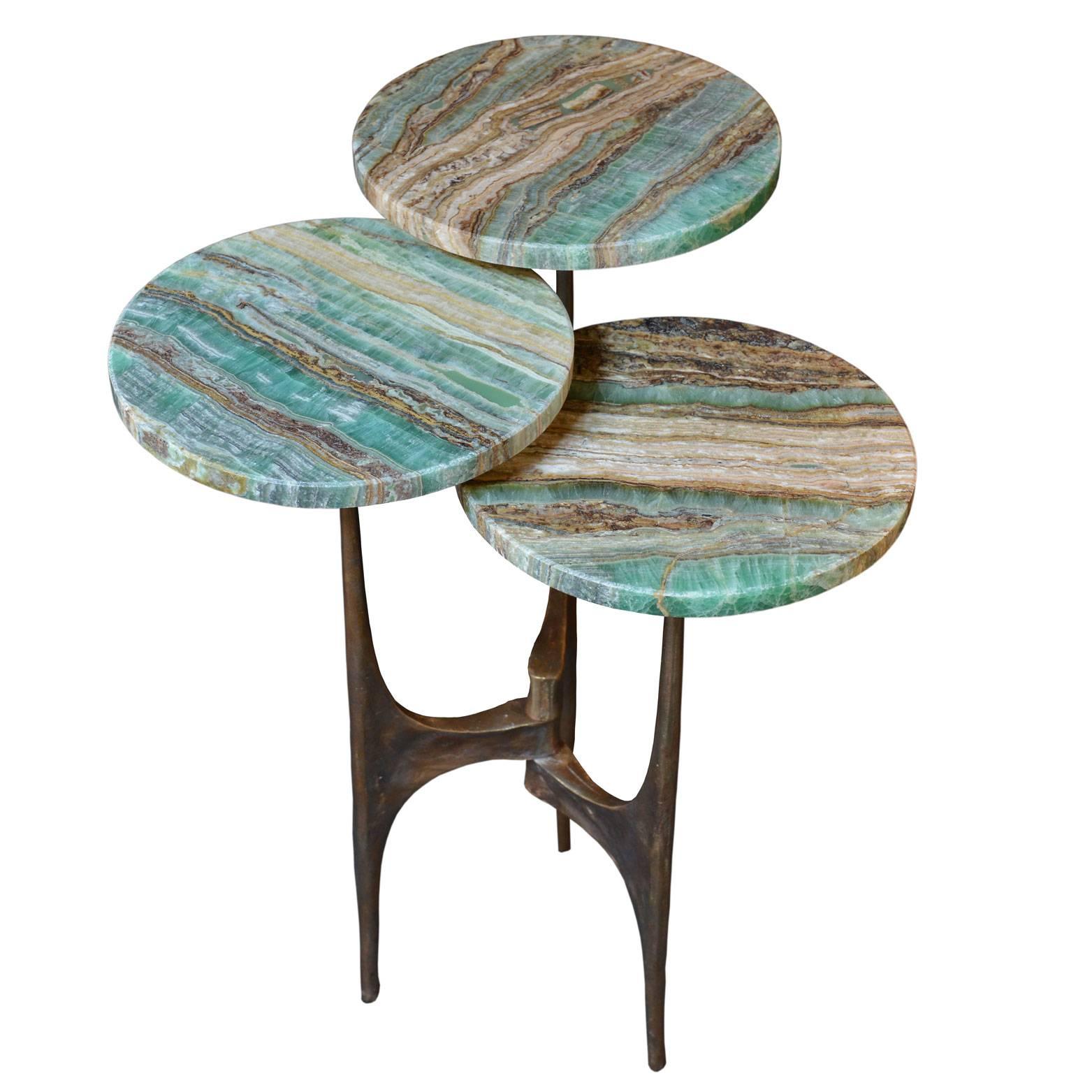 Side table in bronze and marble, realized by Local Artisans on our own design. Each of the three circles has a diameter of 28 cm. Each table has a height of 66cm.
The kind of stone can be customized, according to request and availability.