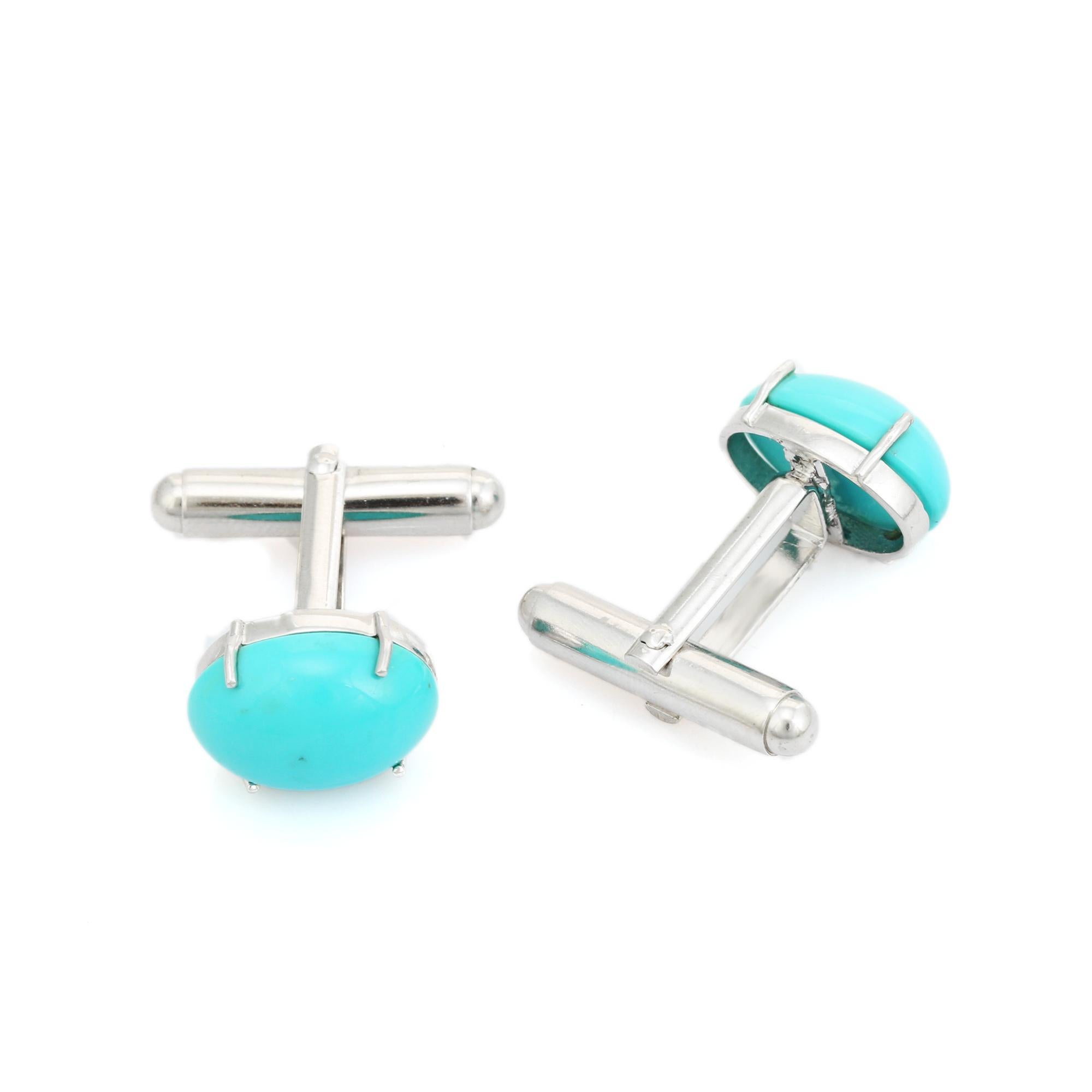 These Handcrafted Silver Men’s Cufflinks Set in Oval Turquoise Gemstone feature vivid oval turquoise cabochons, prong-set in 925 sterling silver. The captivating sky-blue hue of the natural turquoise stones evokes classic Southwestern charm while