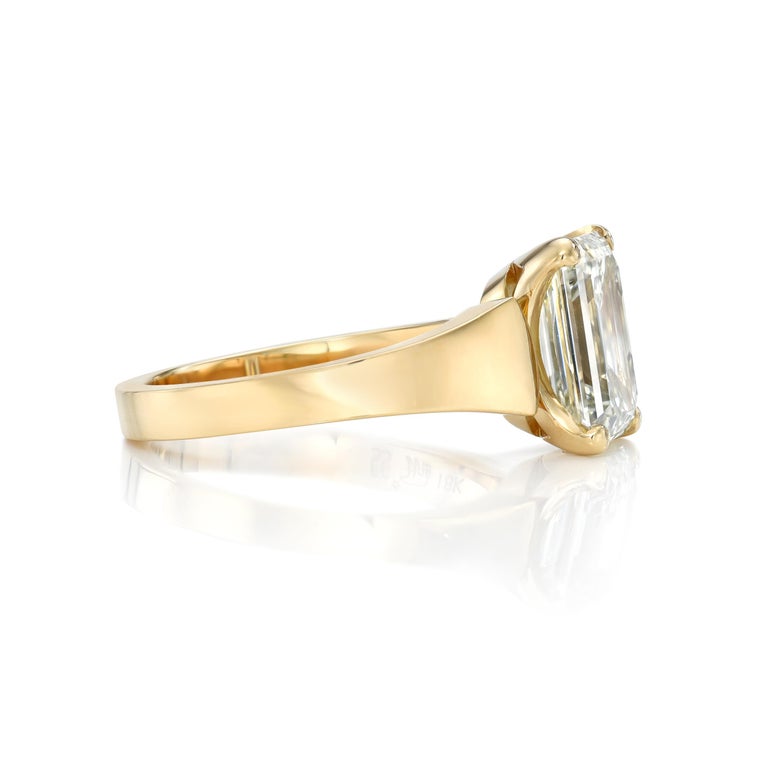 2.47ct M/VS2 GIA certified emerald cut diamond prong set in a handcrafted 18K yellow gold mounting.