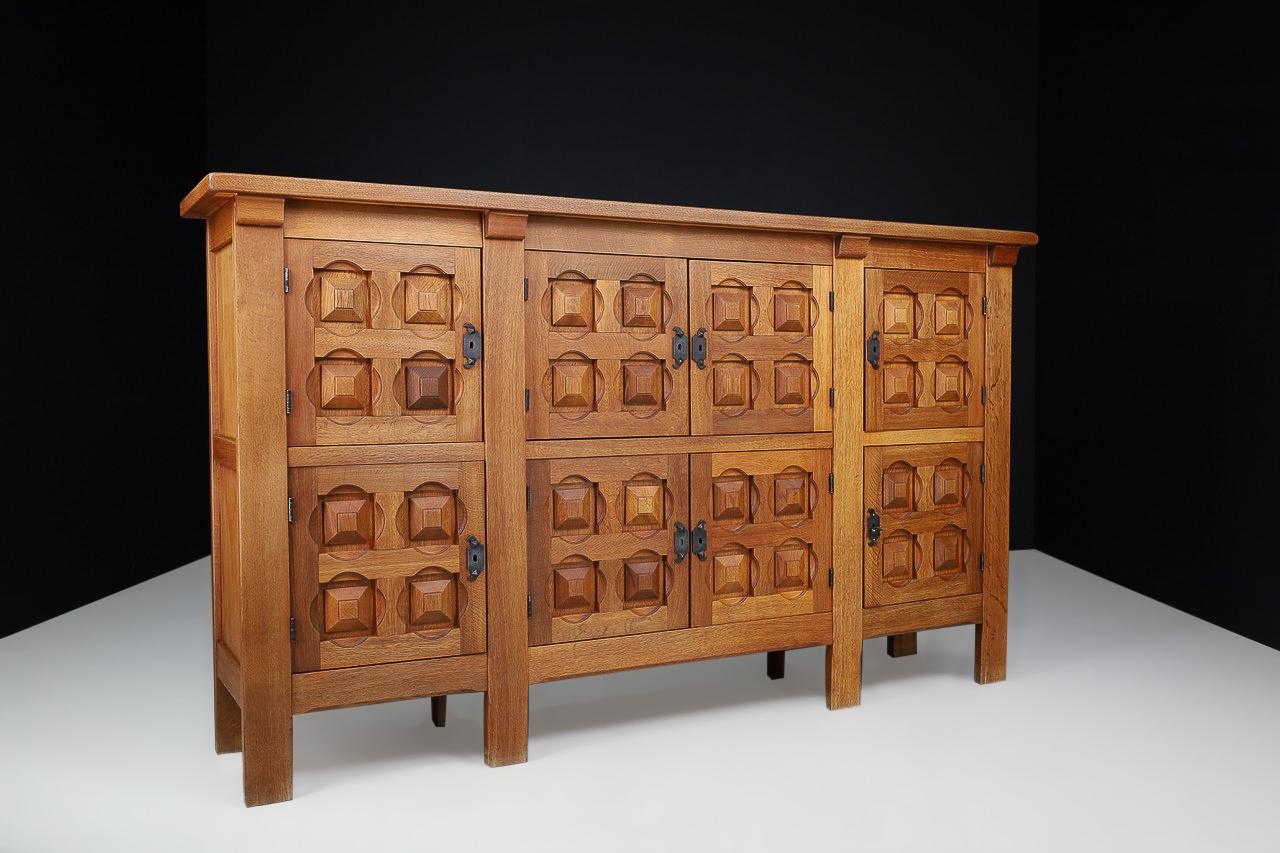 Mid-20th Century Handcrafted Solid Oak Credenza with Wrought Iron Details Spain 1940s For Sale