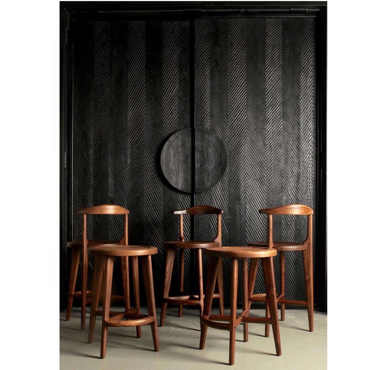 A Classic design that will beautifully suit any home interior. Crafted from solid American black walnut, wood is hand-selected for color uniformity and quality. Our bar stools feature generously sized seats, sculpted for comfort.

Joinery is