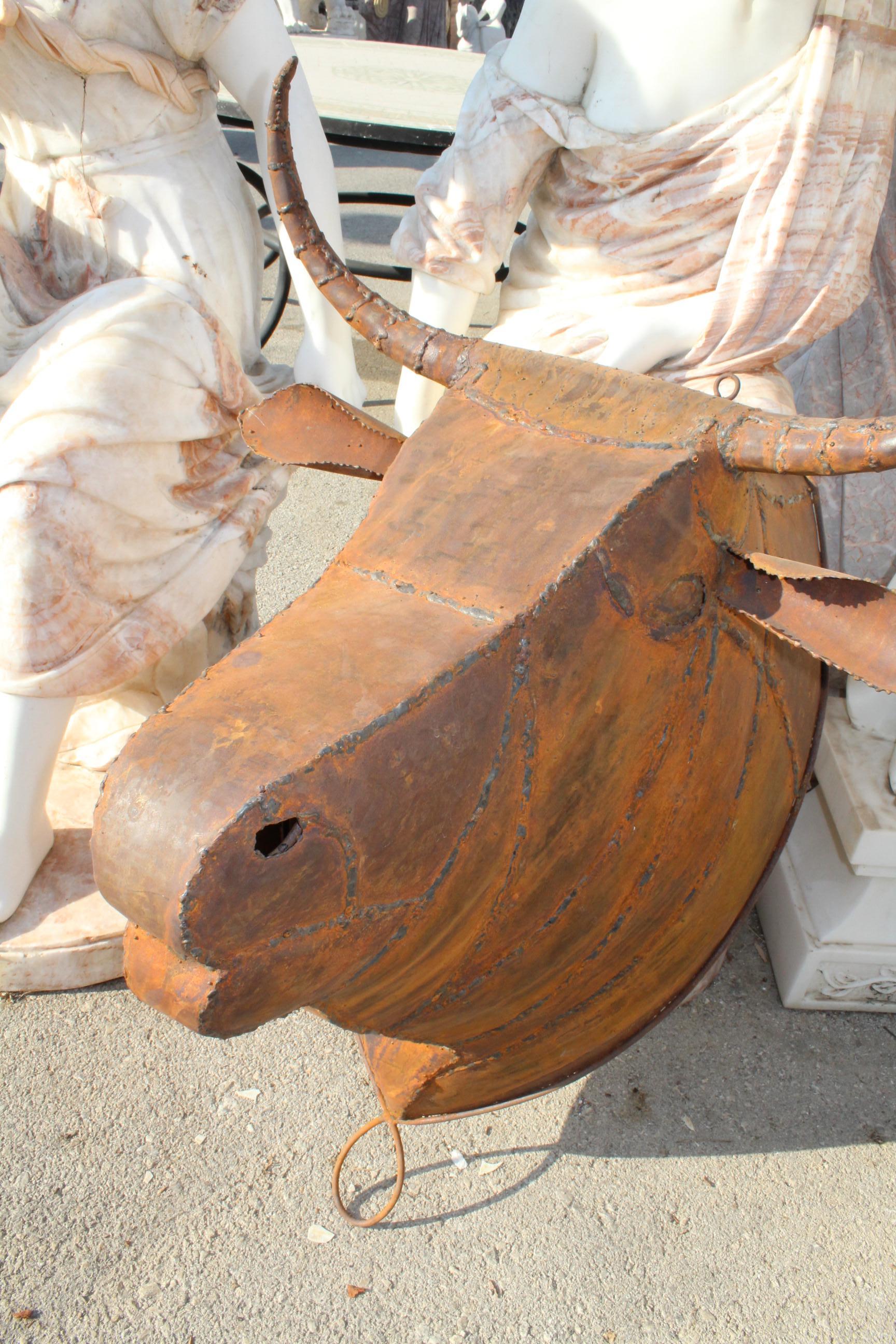 Handcrafted Spanish bull iron head sculpture.