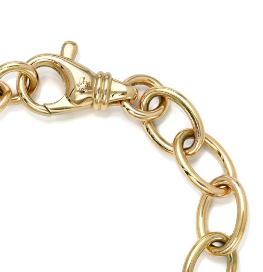 Handcrafted 18k yellow gold oval link bracelet. Bracelet measures 7.5