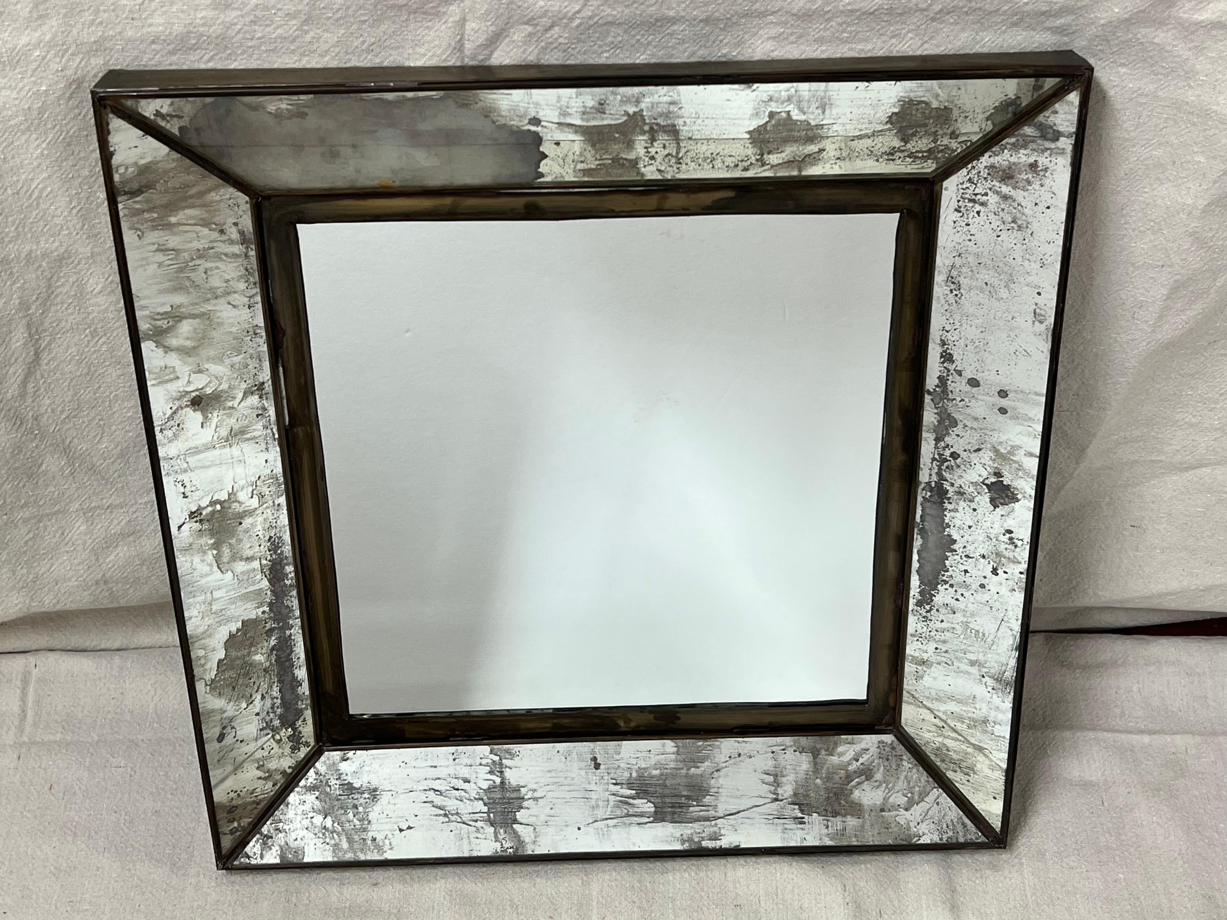Handcrafted Square Mexican Tin Mirror.  Perfect for a home with small wall space . 
This rustic handcrafted mirror is loaded with character and has antique appeal.
Inspired by a vintage Mexican picture frame it has a distressed finish and an