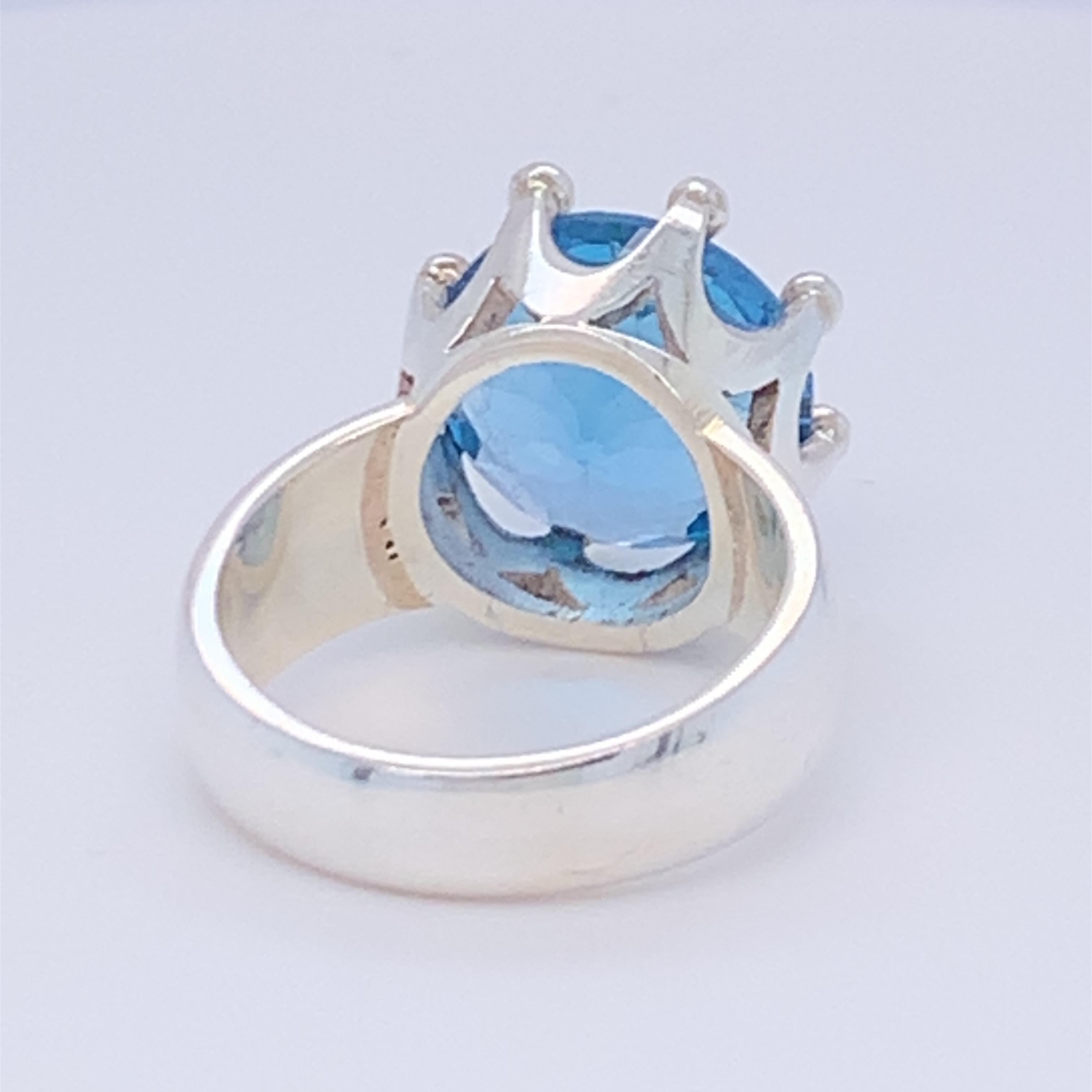 Round Cut Handcrafted Sterling Silver Crown Design Blue Topaz Ring For Sale