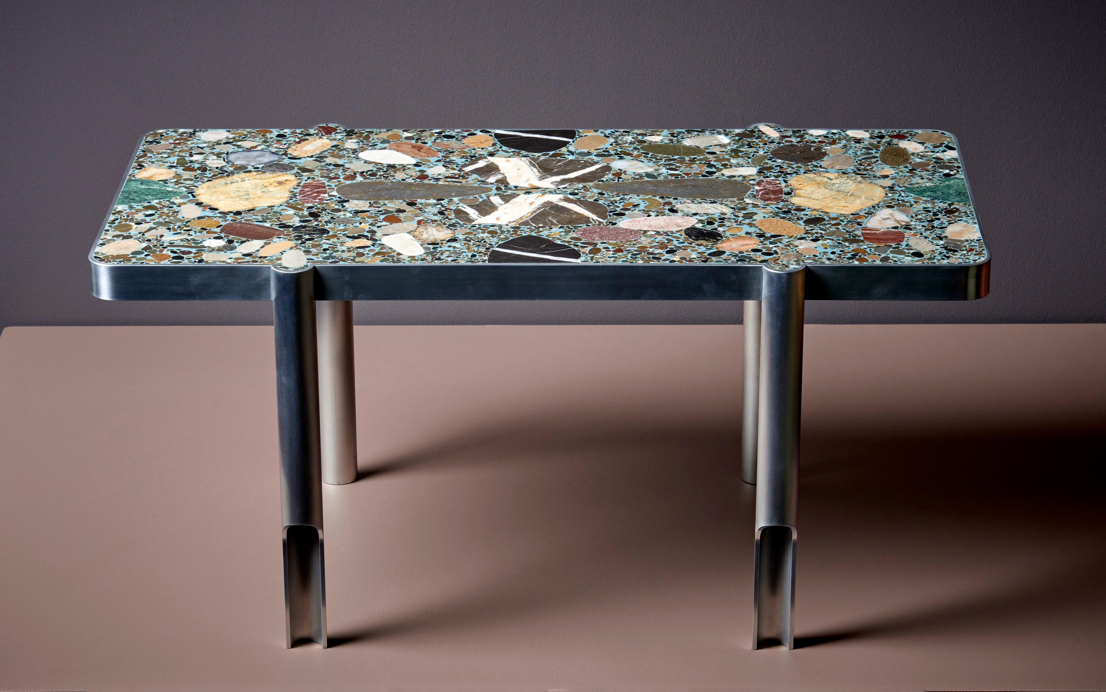 This table is handcrafted and has been made in three different sizes, please check our other listings. Each item made by Felix Muhrhofer is a unique, one-of-a-kind piece. Muhrhofer is an Austrian designer who primarily works with steel and terrazzo.