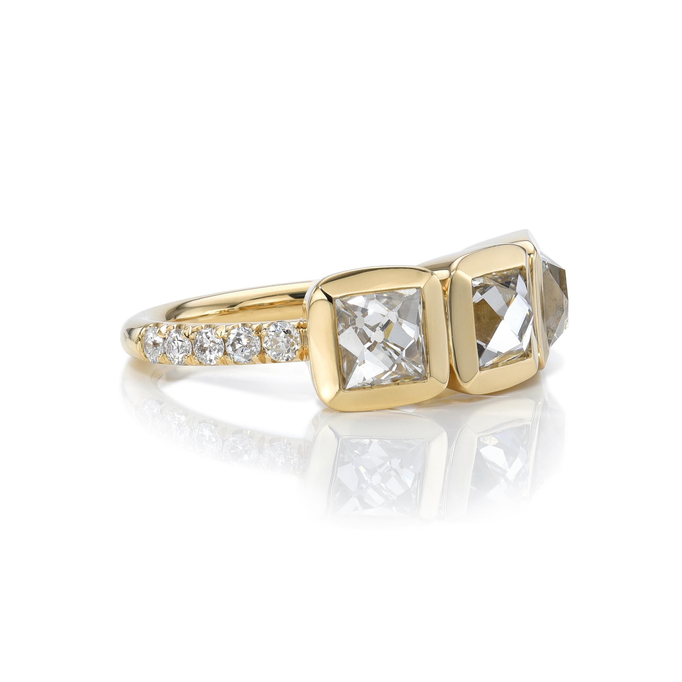 2.76ctw F-G/VS2-SI1 GIA certified French cut diamonds with 0.31ctw old European cut accent diamonds set in a handcrafted 18K yellow gold mounting.