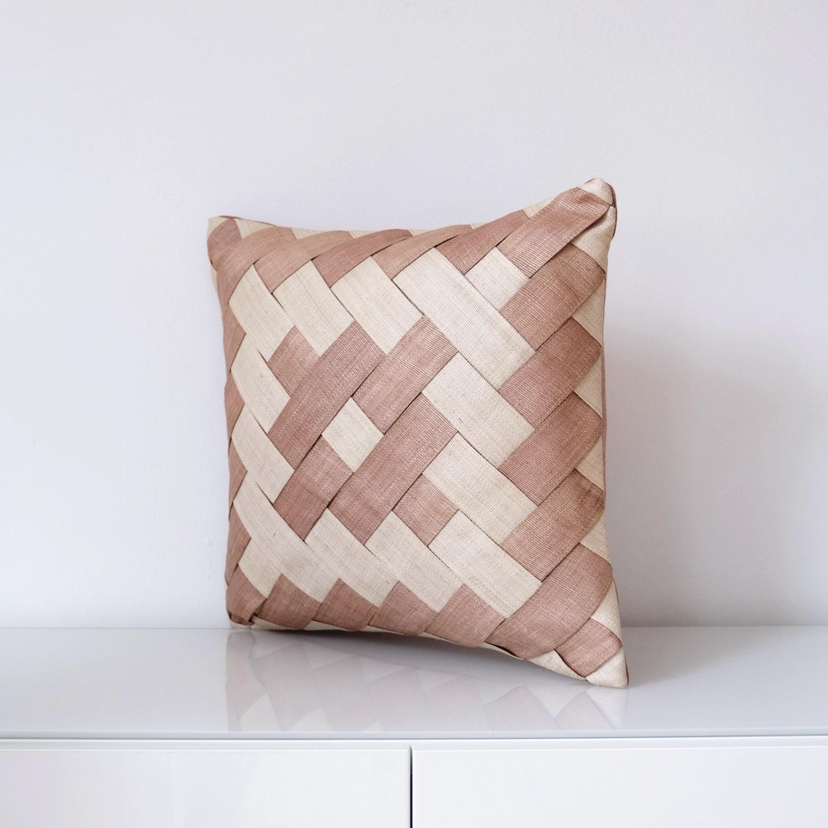 Handcrafted cushion cover made with naturally dyed and delicately woven T’nalak cloth from Abaca fibres and fastened with coconut shell buttons
Colour: light sand and terracotta

Measures 50 x 50 cm
19.7? x 19.7?
Recommended cushion filler: 61