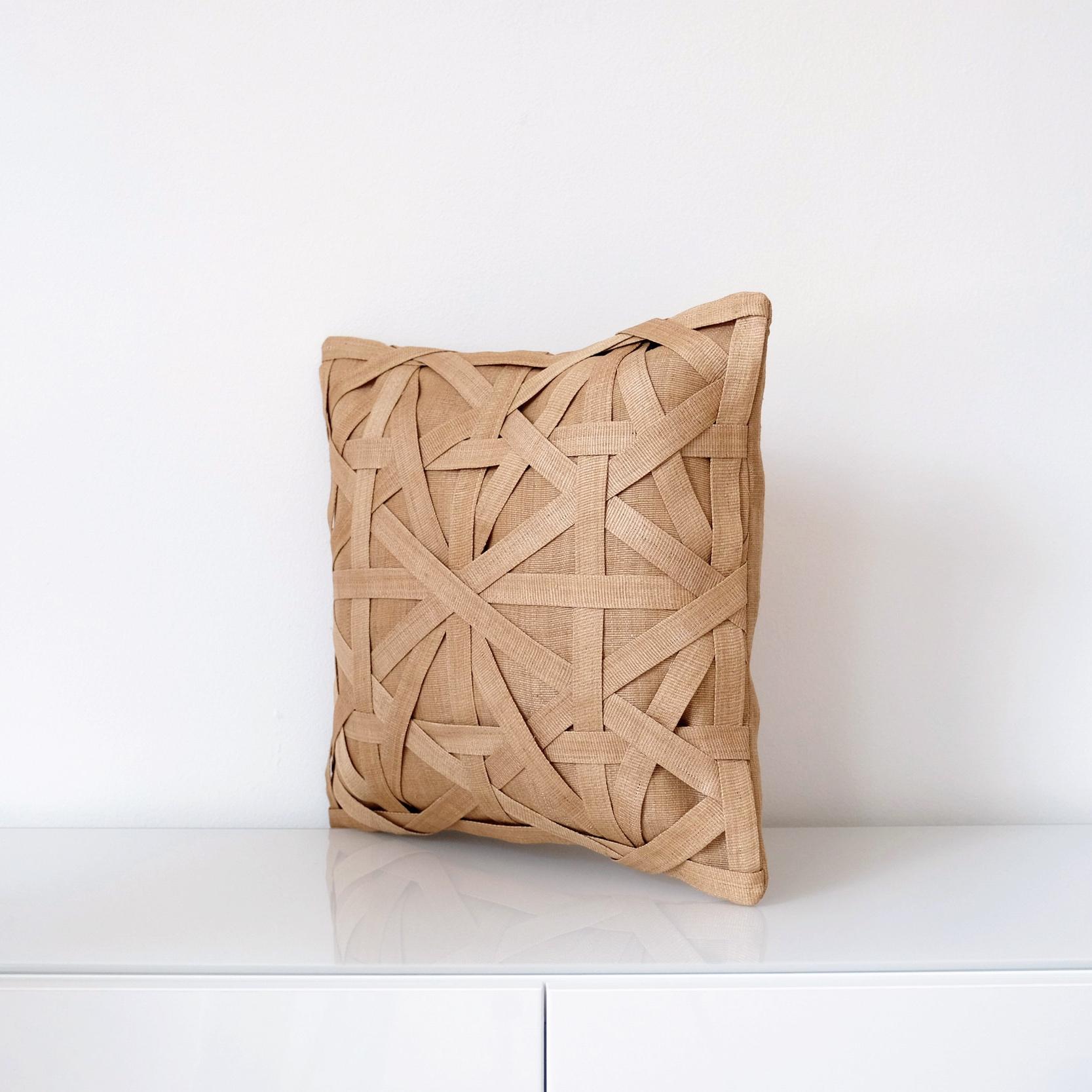 Handcrafted cushion cover made with naturally dyed and delicately woven T’nalak cloth from Abaca fibres and fastened with coconut shell buttons
Colour: light sand and oatmeal

Measures: 45 x 45 cm
17.7? x 17.7?
Recommended cushion filler: 56 x