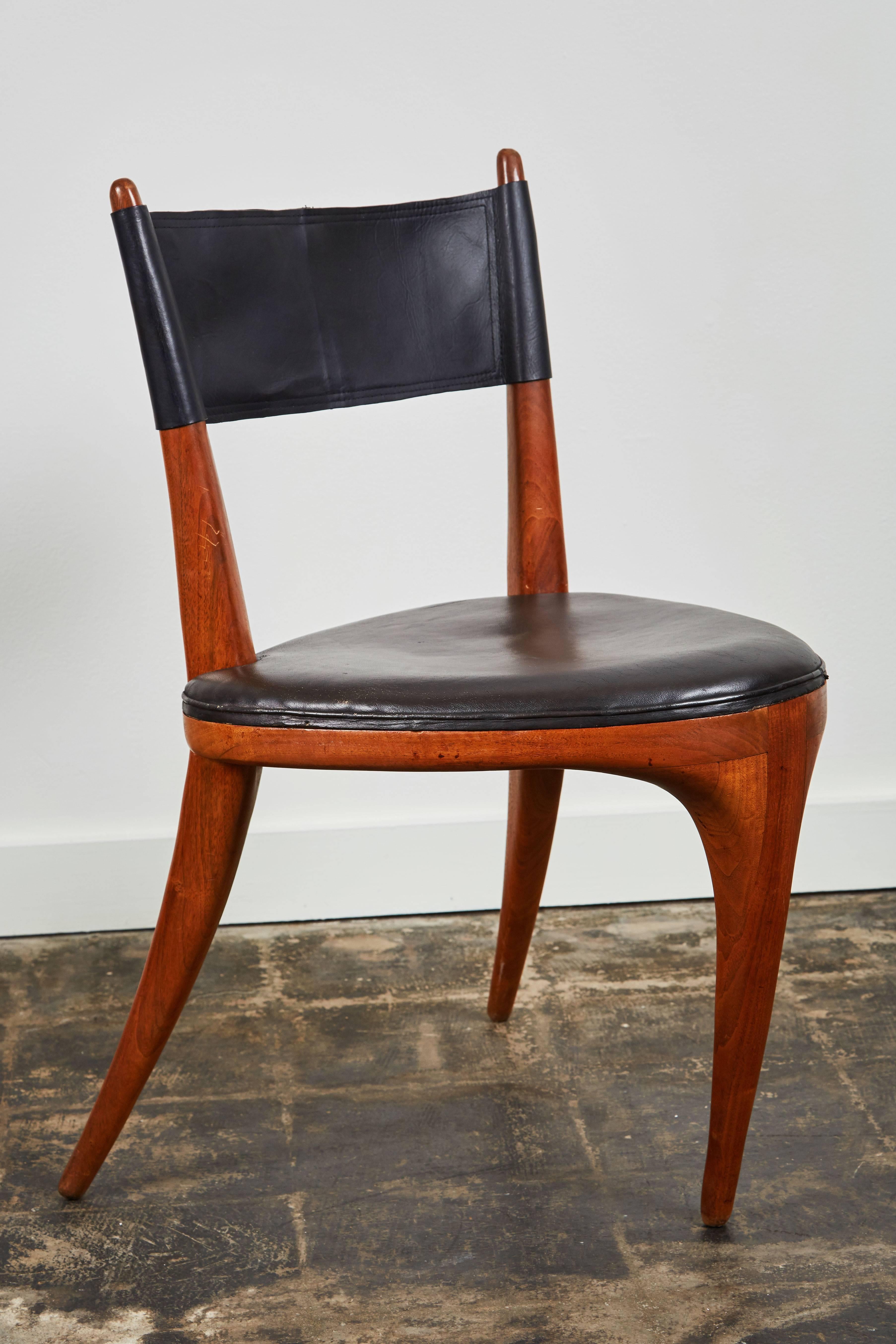 Rare handmade tripod dining chairs in walnut and saddle stitched leather by Arizona craftsman Allen Ditson. Made in USA, circa 1960s.
   