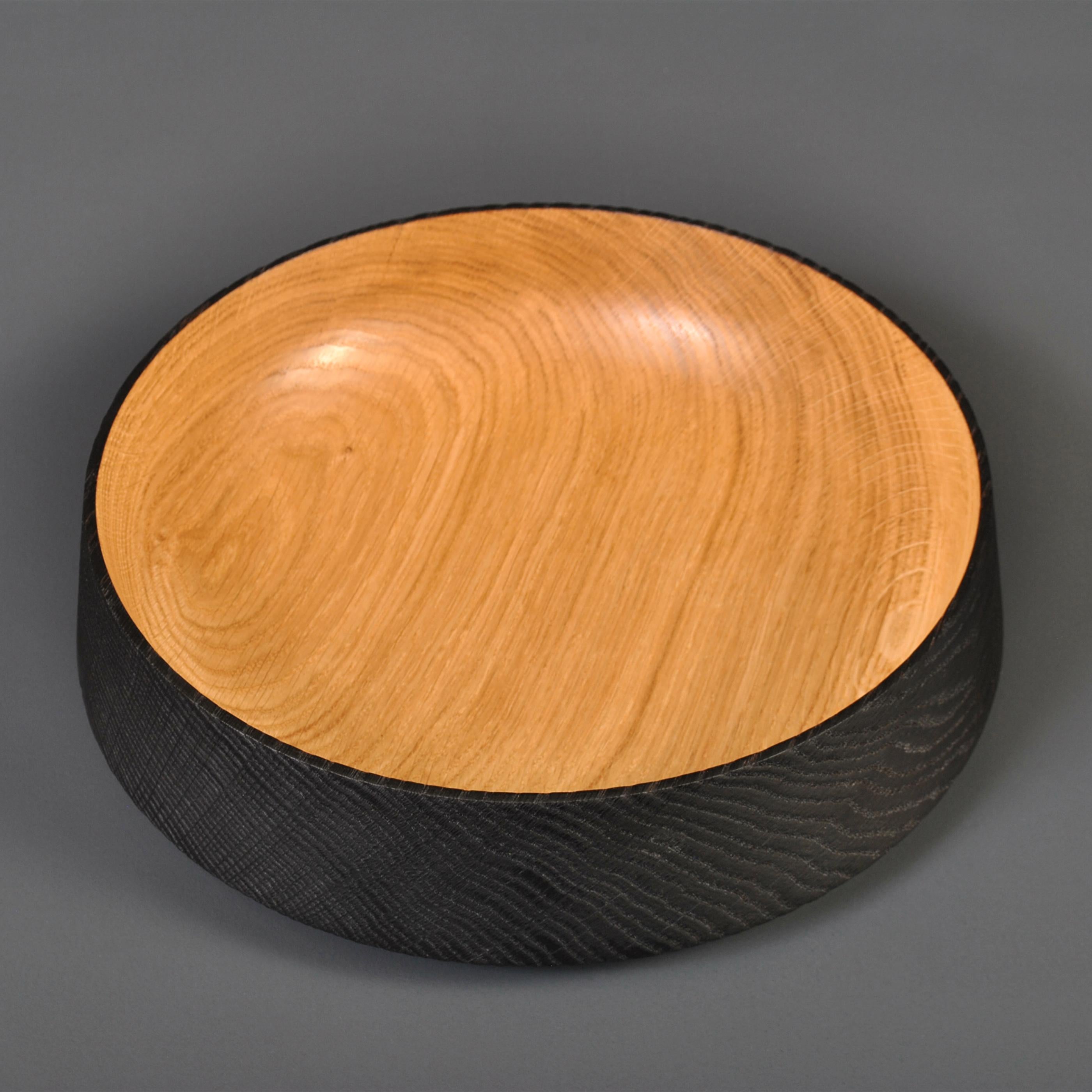 Fine traditionally hand-crafted and turned Oak half Yakisugi platter - bowl. These are handmade to the very best quality in London using traditional techniques.
Finished in food safe oil.
A beautiful piece of handmade contemporary design with a