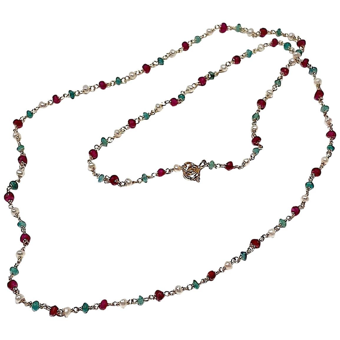 Collana artigianale Ugolini con smeraldi a 3 carati e granati in oro giallo a 18 carati