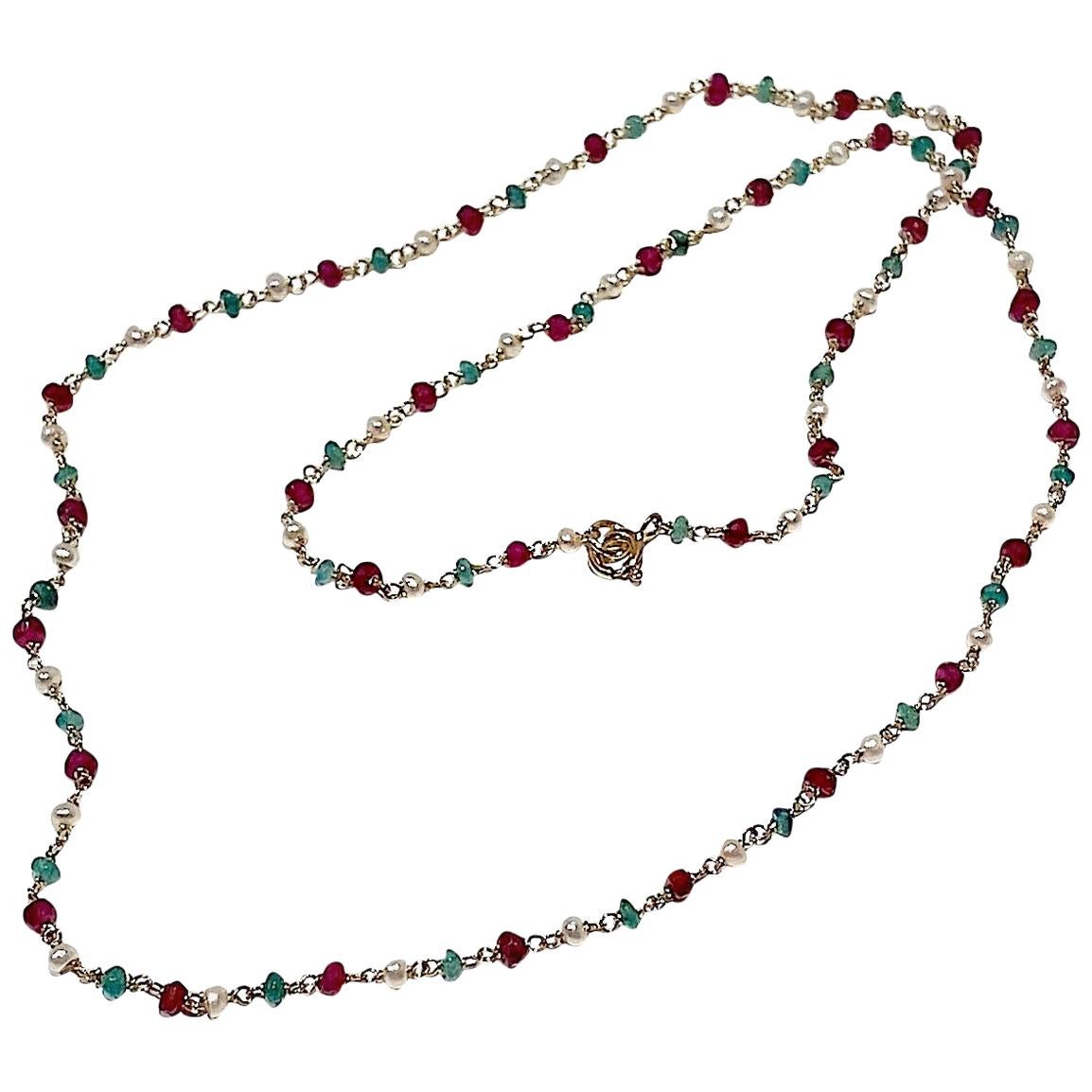 Handcrafted Ugolini 3Karat Emeralds 18 Karat Yellow Gold Garnets Beaded Necklace For Sale