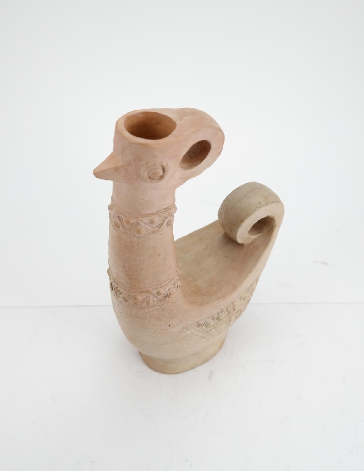 Handcrafted unglazed ceramic bird shaped vase, 1960s.