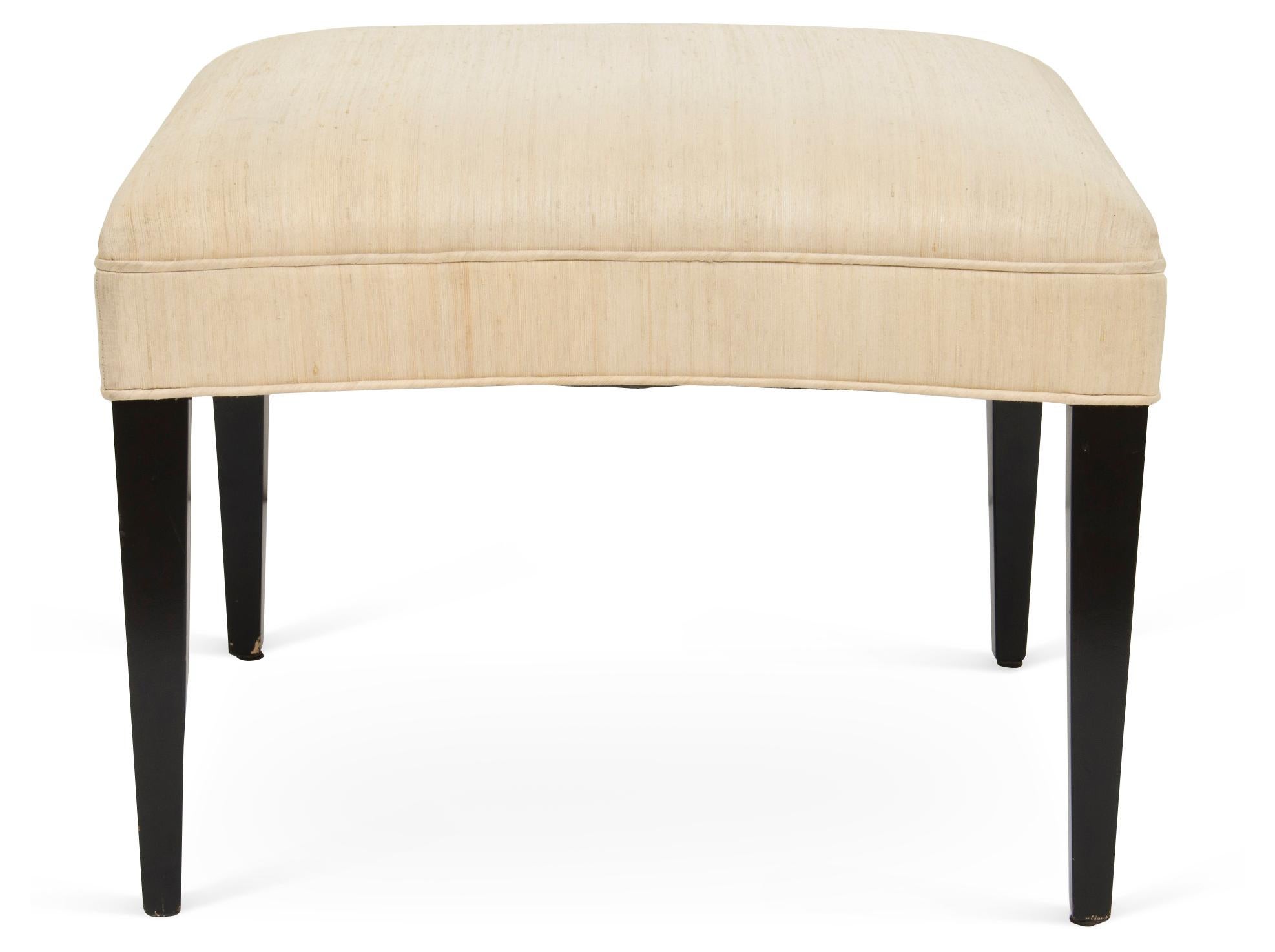 American Handcrafted Upholstered Ottoman with Tapered Legs and Convex Sides For Sale