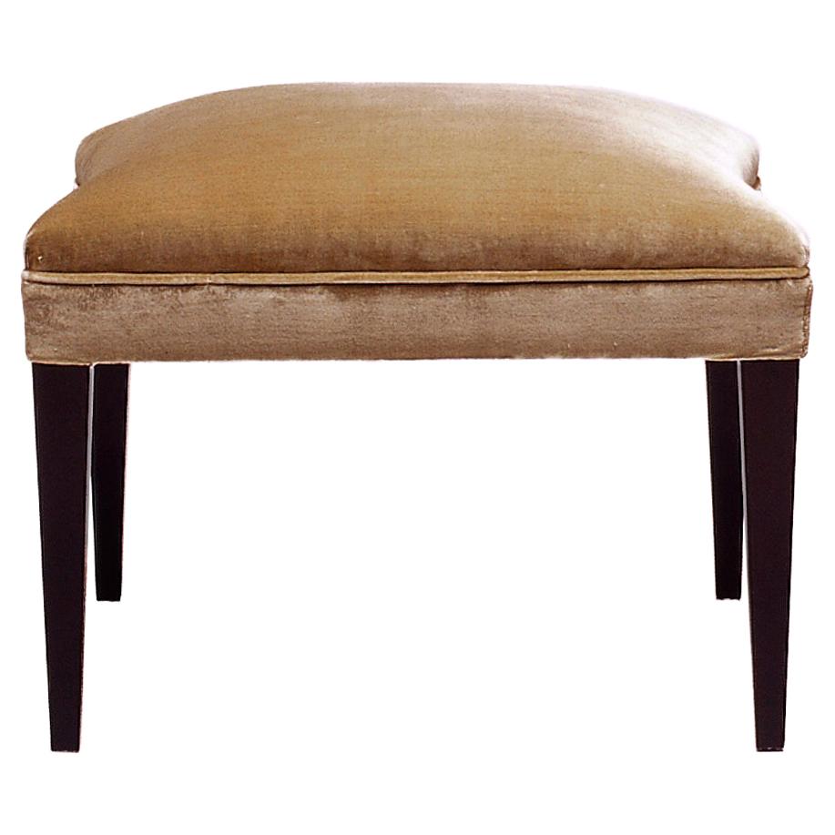 Handcrafted Upholstered Ottoman with Tapered Legs and Convex Sides