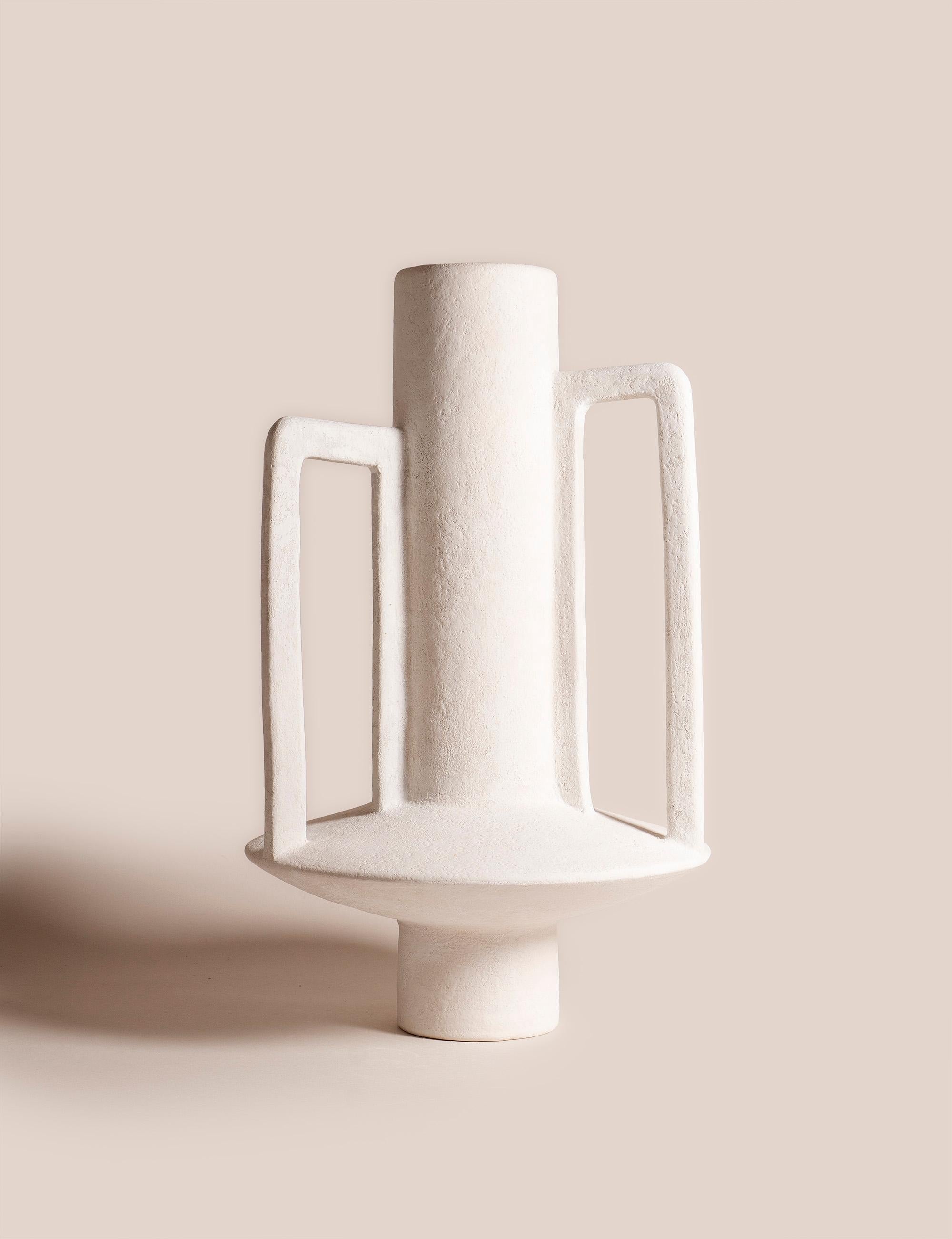 Handcrafted Vase 071 by Lovebuch
Dimensions: Ø 25 x H 35 cm
Materials: Sandstone, porcelain, handcrafted piece

Katia works with wood and clay, these raw, powerfully expressive materials are shaped to create a poetry of objects that inhabit our