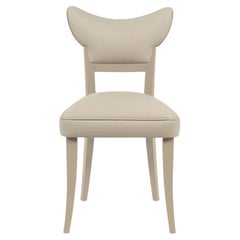Sedia da pranzo artigianale in velluto dalla silhouette retrò