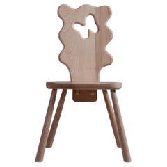 Silla artesanal de fresno ondulado