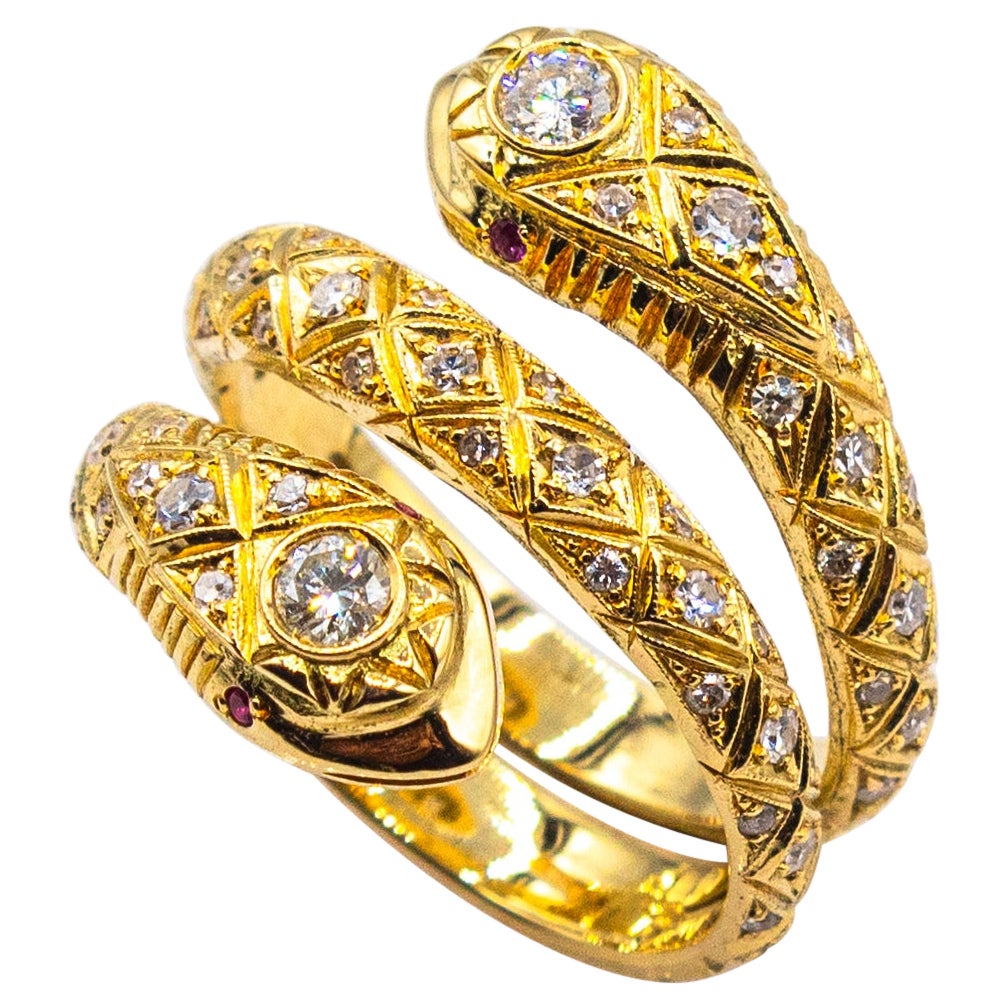 Bague "serpent" en or jaune, rubis, diamant blanc taillé en brillant, faite à la main