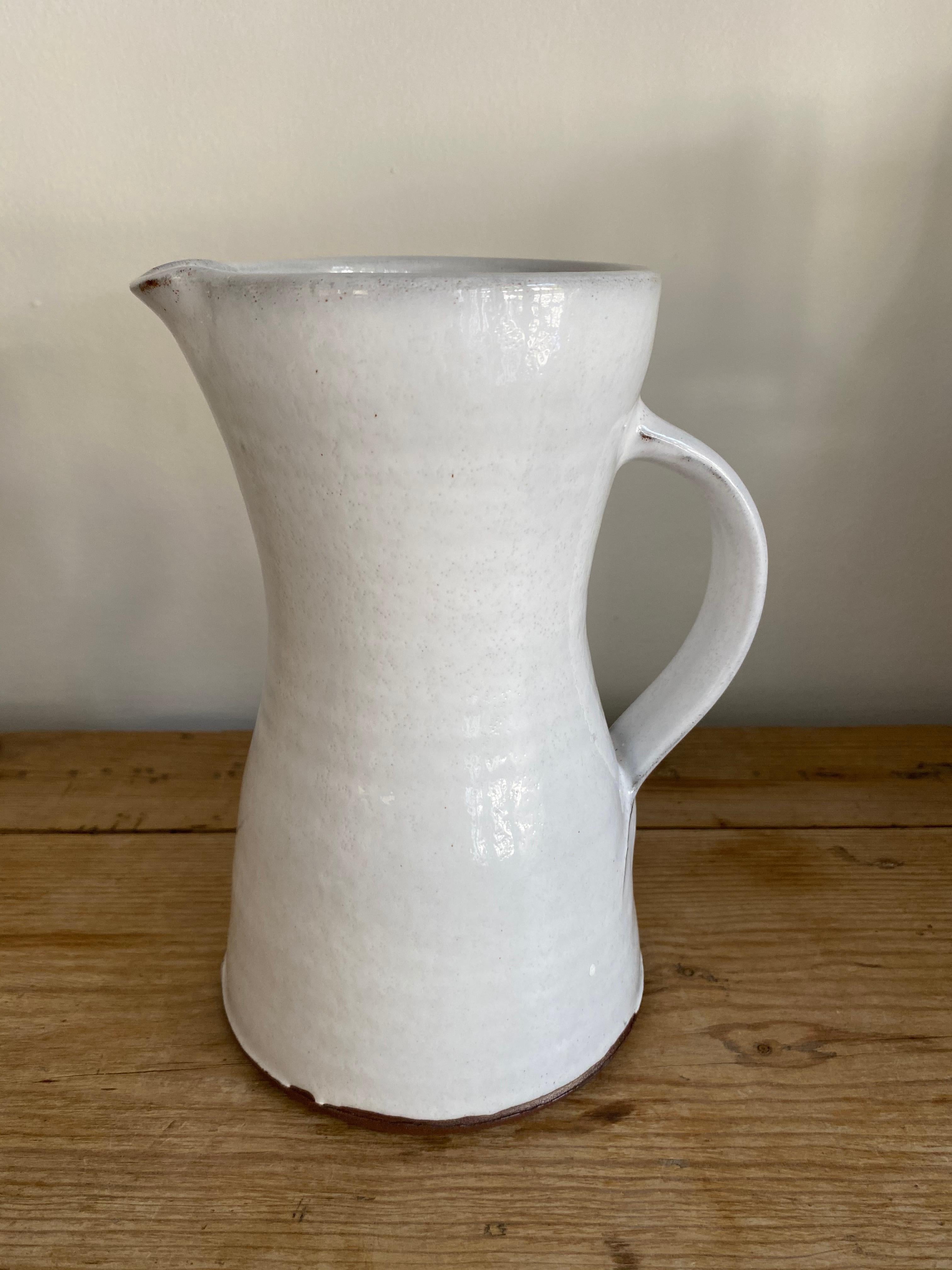 Handcrafted stoneware pitcher with white glaze by Mats Svensson

Sweden, 2010-2020. 
 