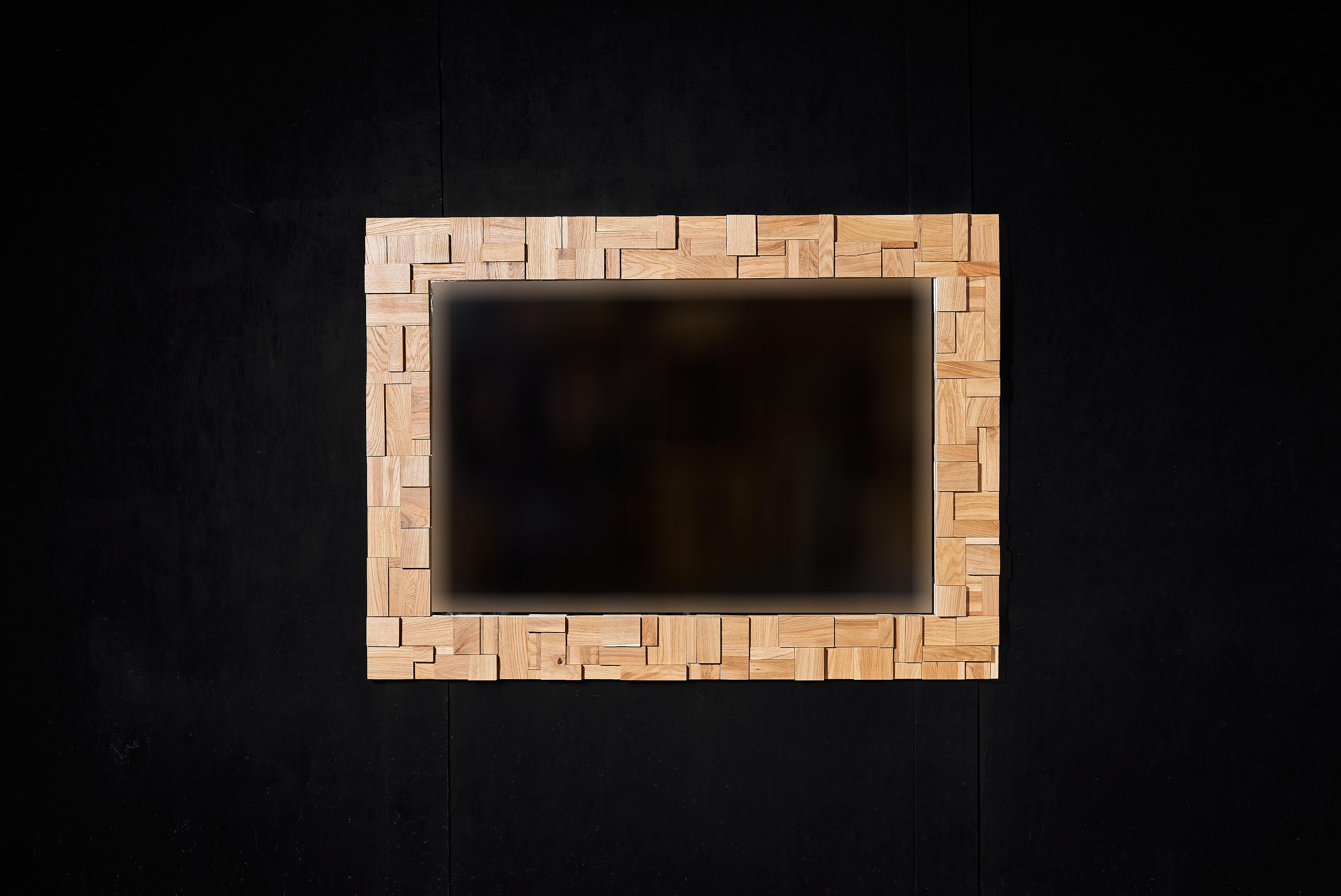 Miroir en bois artisanal Cadre en mosaïque de chêne Décoration murale Miroir design

Rehaussez votre intérieur avec ce miroir exclusif fabriqué à la main et doté d'un cadre en bois composé de segments de chêne disposés de manière complexe. Chaque