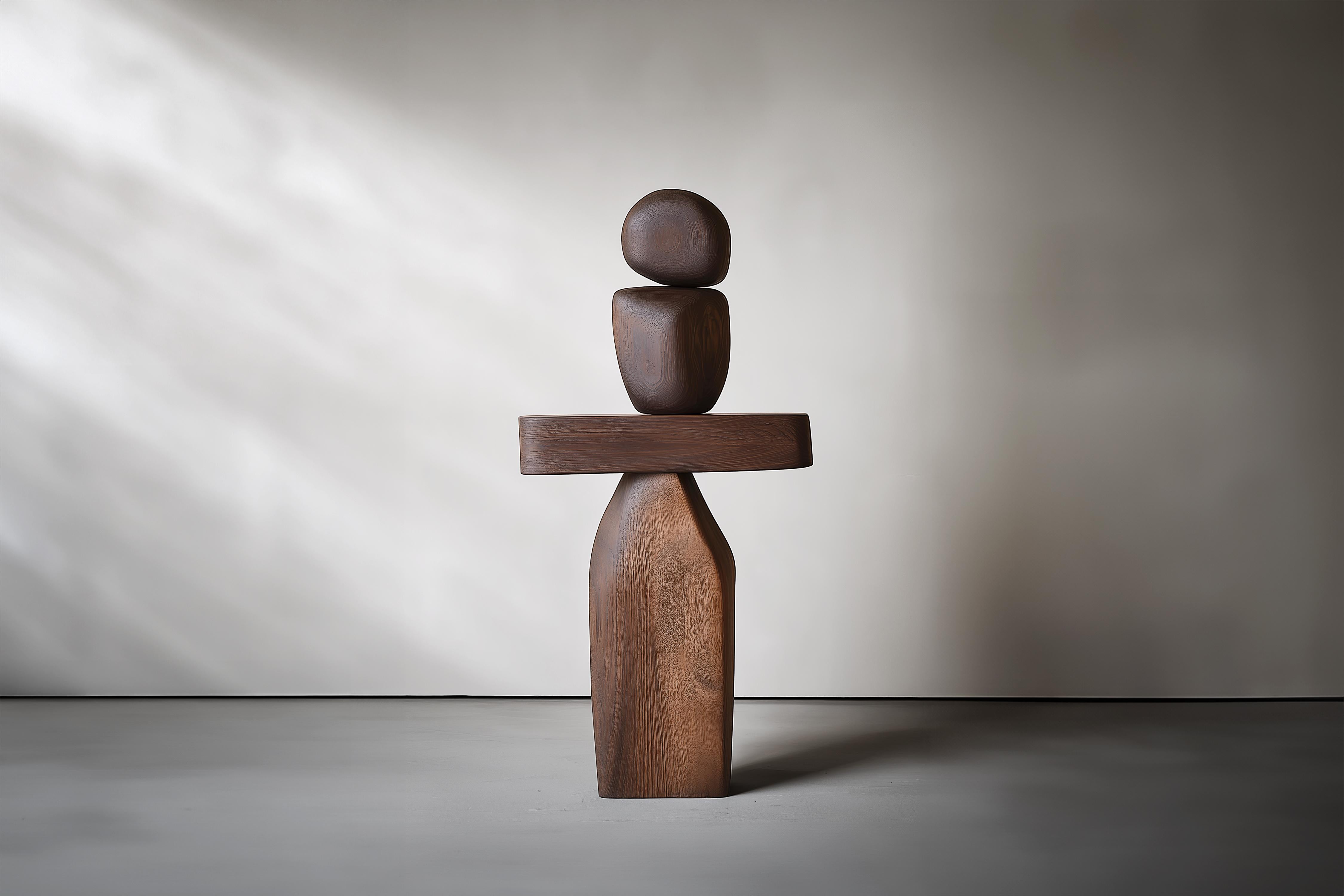 Scultura artigianale in legno Lull No111 - Arte contemporanea by NONO


---
L'equilibrio e la tensione sono al centro di queste sculture. L'interazione tra le forme lisce e arrotondate e le basi solide e angolari crea un delicato equilibrio che