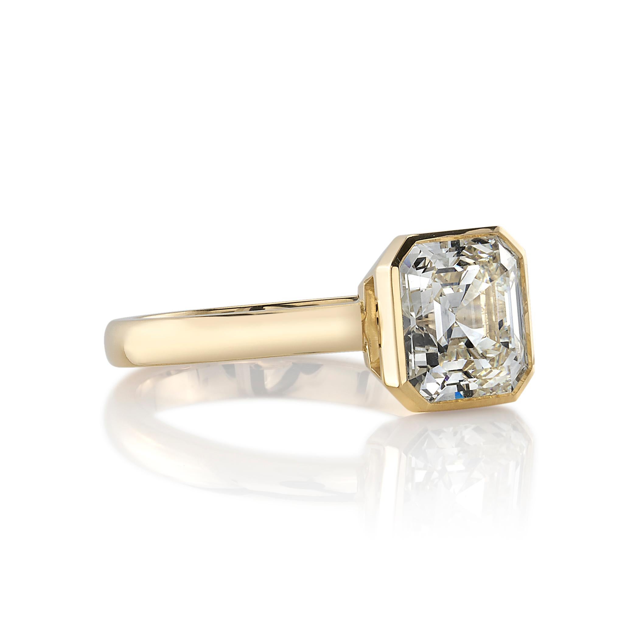 2.21ctw M/VVS1 GIA certified Asscher cut diamond bezel set in a handcrafted 18K yellow gold mounting.

Ring is currently a size 6 and can be sized to fit.

Our jewelry is made locally in Los Angeles and most pieces are made to order. For these