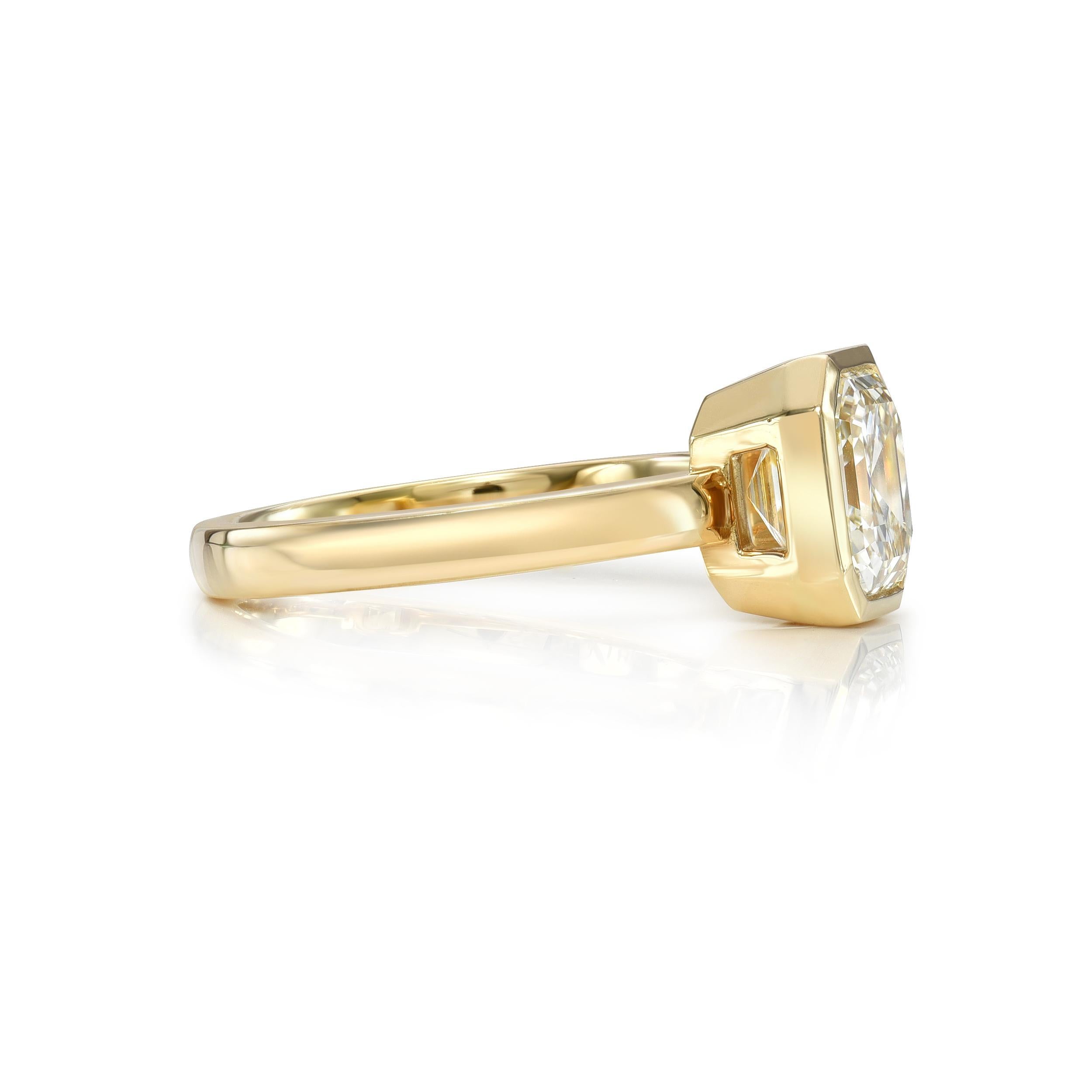 2.12ct L/VVS2 GIA certified Asscher cut diamond bezel set in a handcrafted 18K yellow gold mounting.