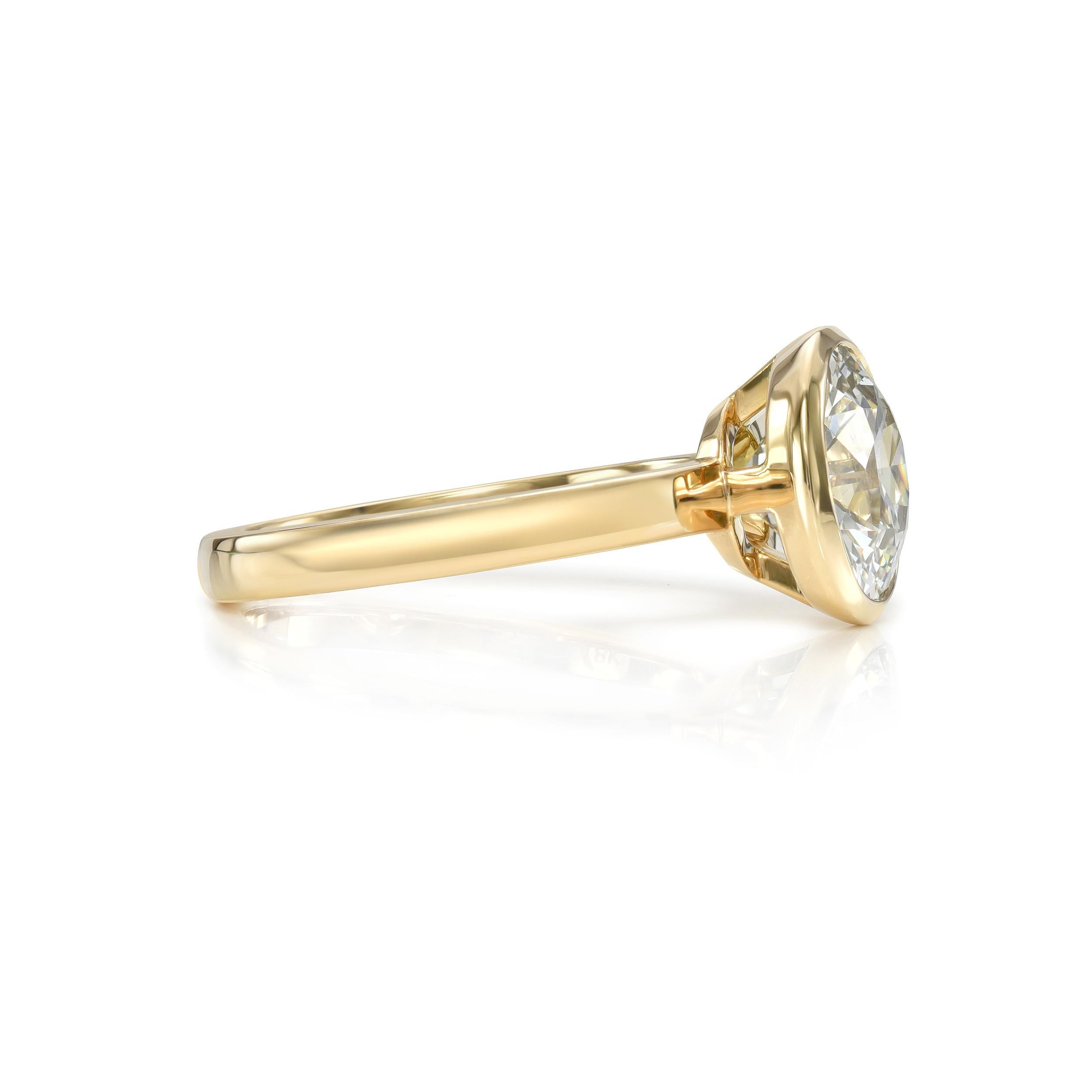 2.48ct L/SI1 GIA certified old European cut diamond bezel set in a handcrafted 18K yellow gold mounting.