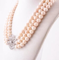 Handcrafted Beaded Coral Necklace with 18 Karat Gold and Diamonds Central Flower