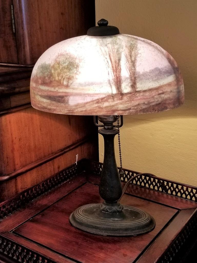 Beautiful and rare early 20th century American Handel scenic reverse or inside painted Boudoir lamp with 10 inch shade…..model number 6672.

This is a gorgeous and original Handel lamp in near mint condition.

It is fully and properly signed on