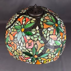 Lampada da tavolo firmata da Handel Lamp Company dei primi anni del 1900 con fiore di tromba