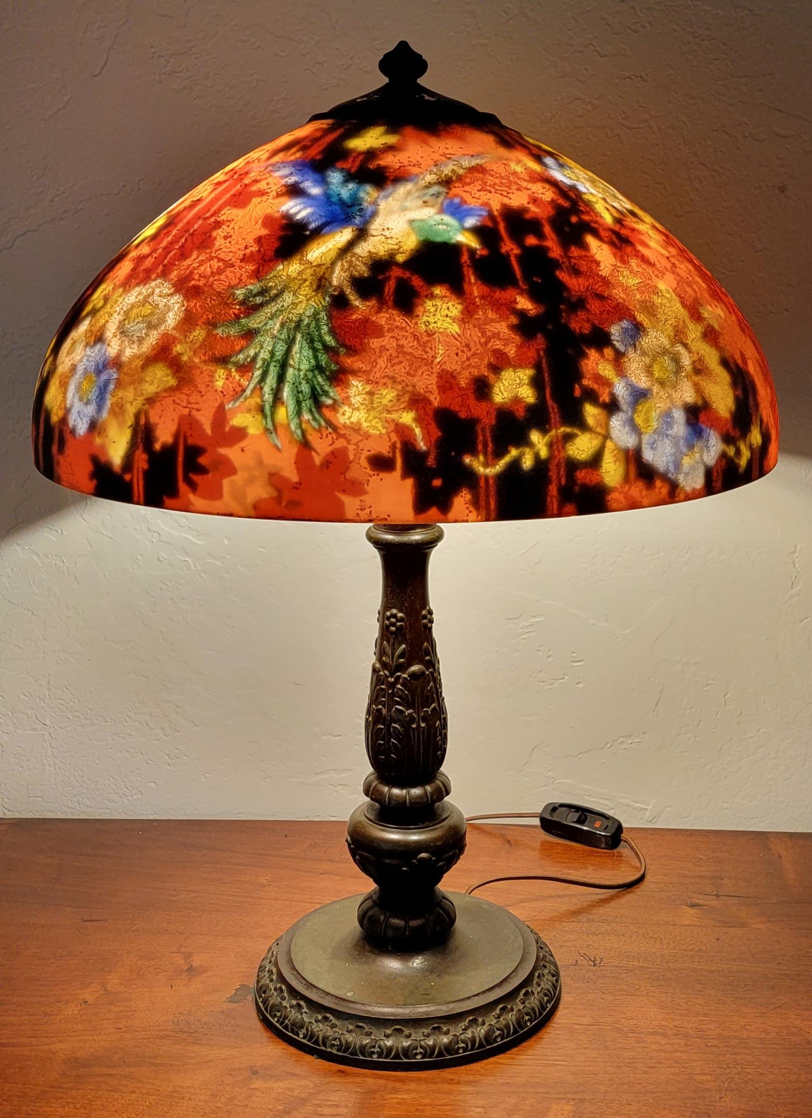 Exceptional art glass table lamp by Handel Company, circa. 1920. Reverse glass 