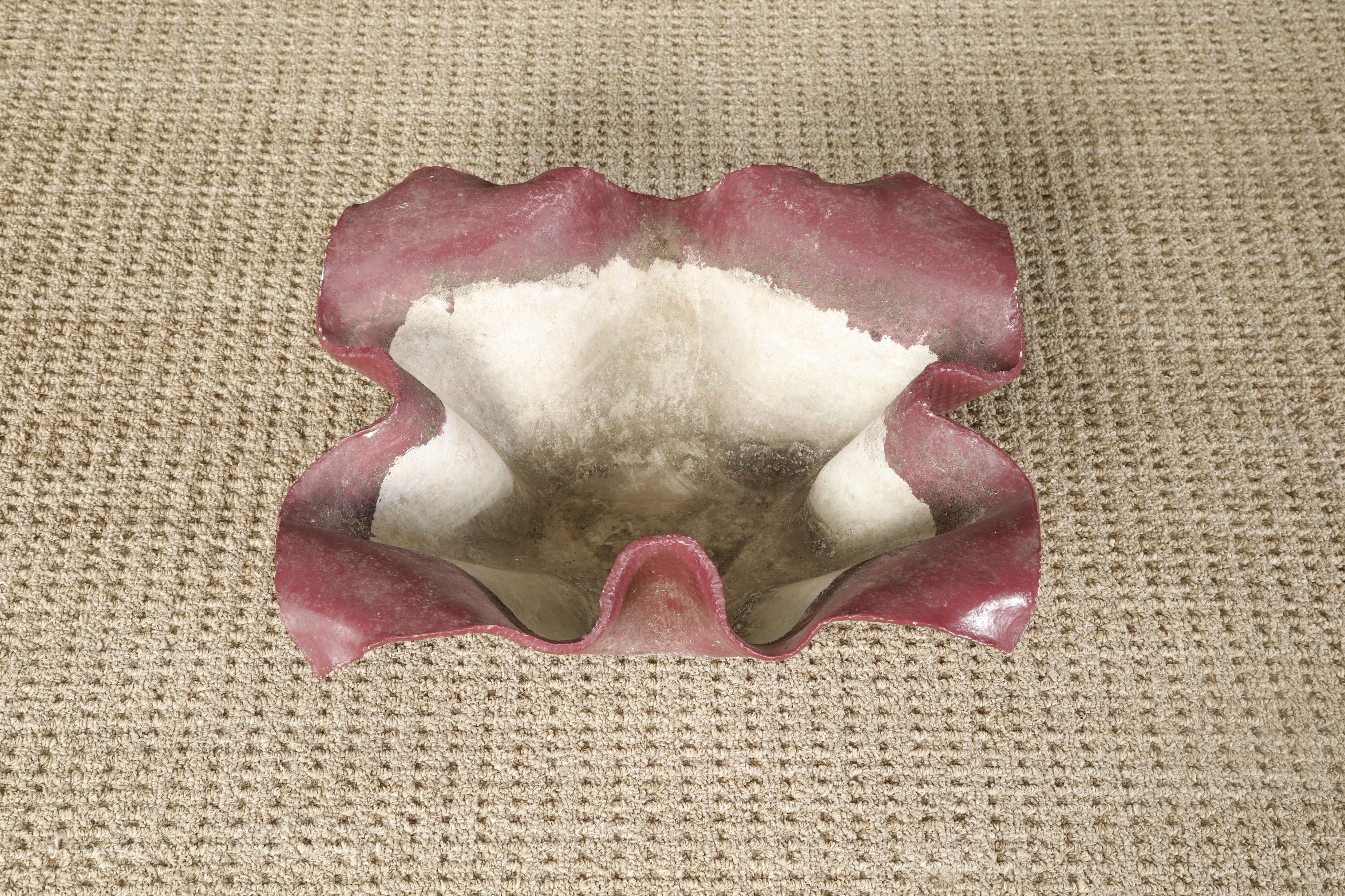 This beautiful 'Handkerchief' concrete planter in a lovely red color by Swiss architect Willy Guhl for Eternit, circa 1968 Switzerland has beautiful patina including fine moss and lichens. 

Origami, clam, folded napkin, fried dumpling.... just some