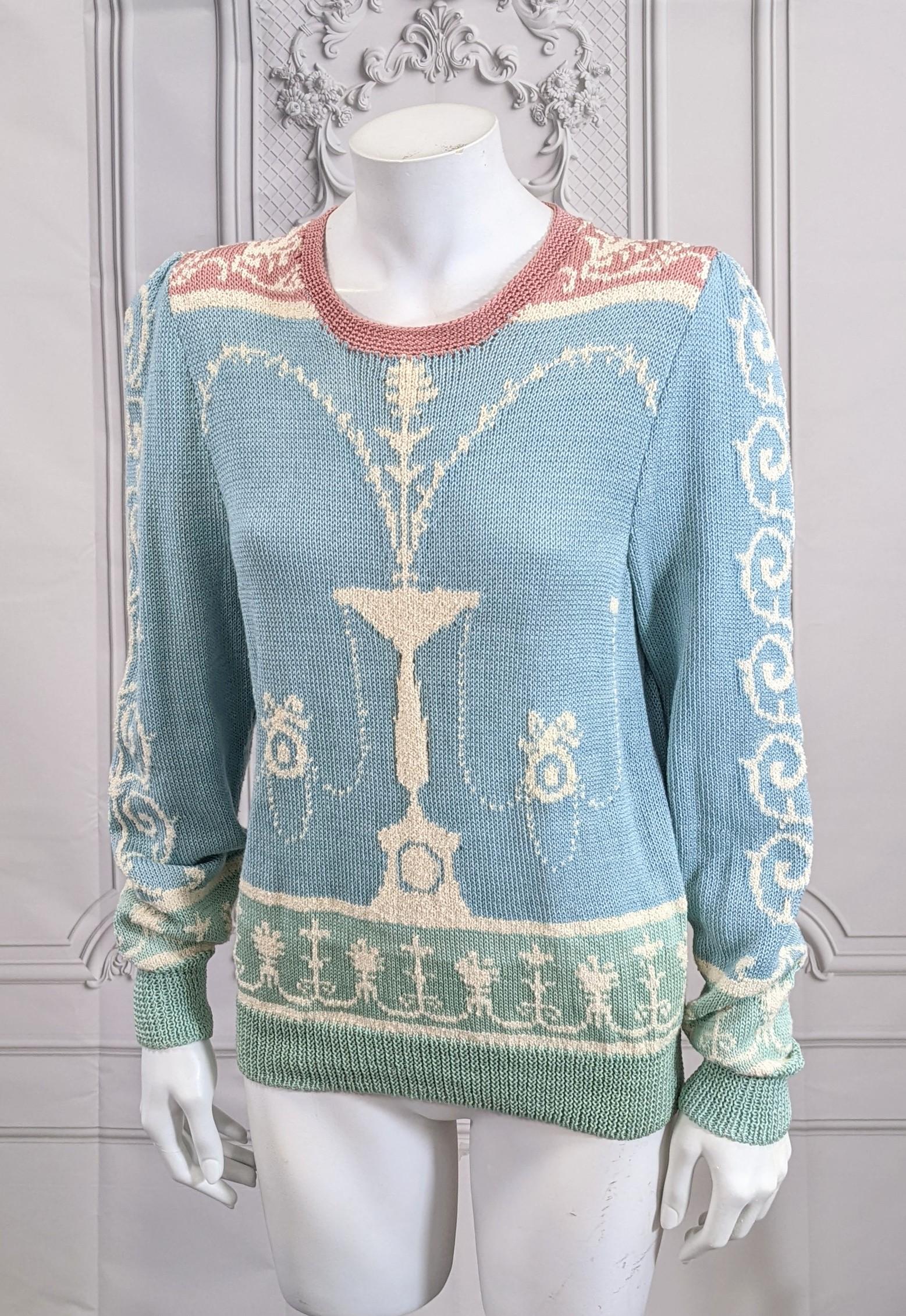 Charming and unusual Handknit Cotton Adams Style Motif Sweater by Dia North of Boston circa 1980's. Motifs knitted in pastels of blue, pink and celadon in the 18th Century Furniture style. Puff shoulders have gathers. 
Size Small-Medium. Vermont