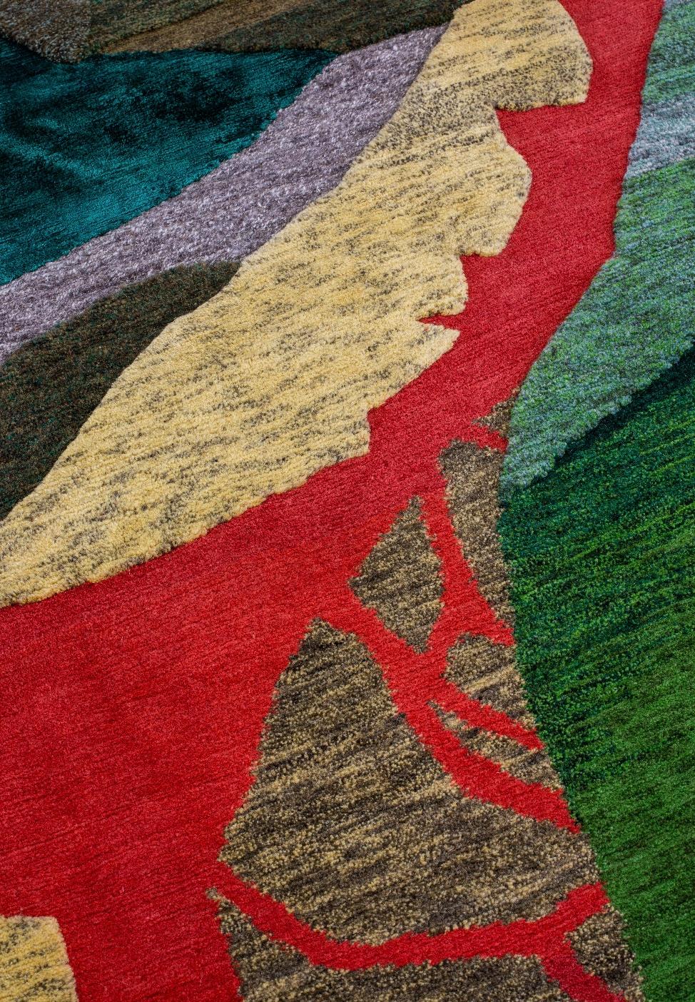 'Leaves' is a carpet or tapestrie developed for MANIERA by Swiss artist and fashion fabric designer Christoph Hefti in 2017. The rug is hand-knotted in Nepal (200 knots, Tibetan cut, loop and shumack) and made from various colours of wool and silk,