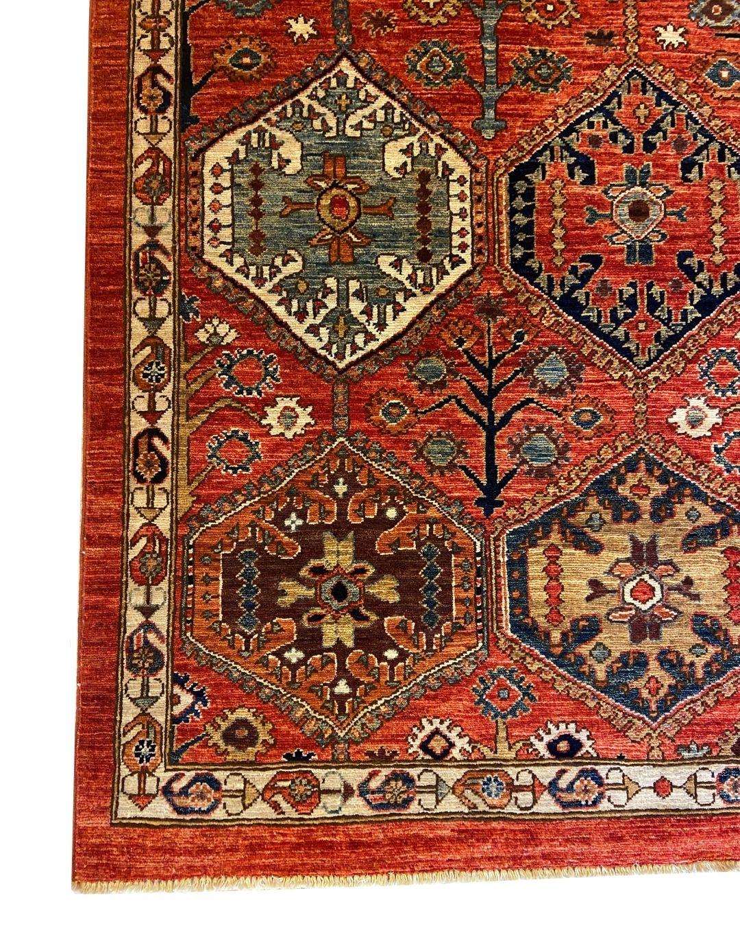 Handknotted Geometric Wool Rug with Tribal Medallions in Red, Blue, Gold 4' x 6' (Stammeskunst) im Angebot