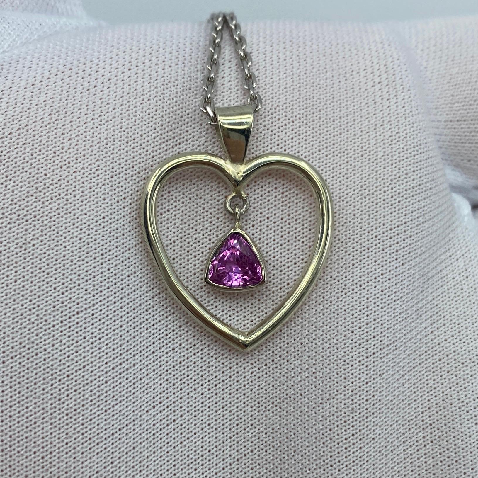 Pink Tourmaline 9k White Gold Pendant Necklace.

Beautiful handmade 0.85 carat vivid pink tourmaline set in a handmade rubover setting and heart pendant.

Top quality, beautiful necklace.

Hanging on an 20' white gold cable chain.

Brand new and