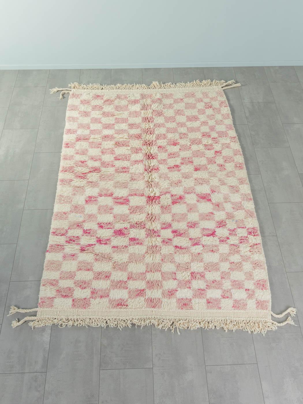 Rosegarden check is a contemporary 100% wool rug – thick and soft, comfortable underfoot. Our Berber rugs are handwoven and handknotted by Amazigh women in the Atlas Mountains. These communities have been crafting rugs for thousands of years. One
