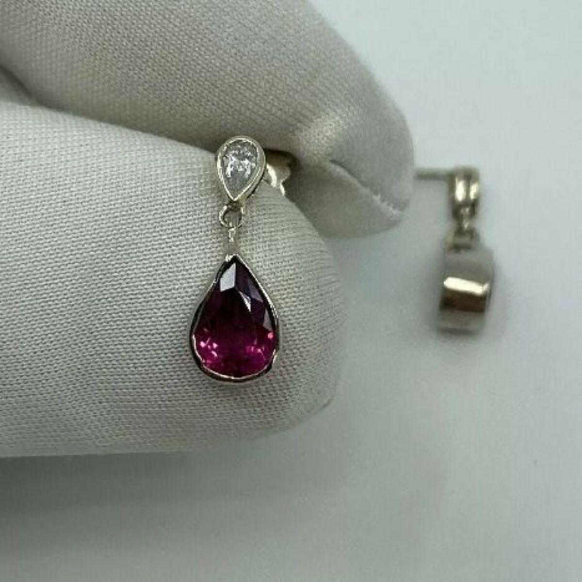 Handmade 1.20ct Pink Rubellite Tourmaline & Diamond 18K White Gold Earring Studs

Pink Tourmaline & Diamond 18 Karat White Gold Earring Studs. 
Beautiful handmade 1.20 carat vivid pink tourmaline & diamond earring studs with G/H Colour Si1/2