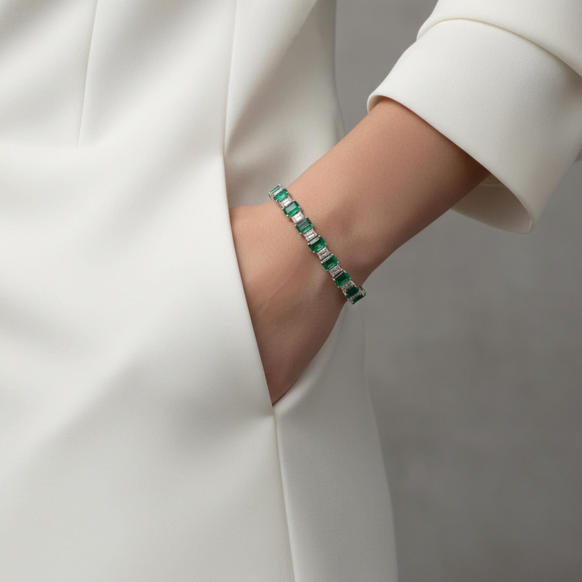 Handmade 13.48Ct Zambian Emerald Diamond Tennis Bracelet 14 Karat White Gold 
The emeralds are positioned along the length of the bracelet in a repeating, evenly spaced pattern. Diamonds alternate perfectly with the emeralds one diamond, one